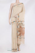 Pure Silk Beige Tussar Saree with Printed design on the body and Zari Border.  displayed on a mannequin
