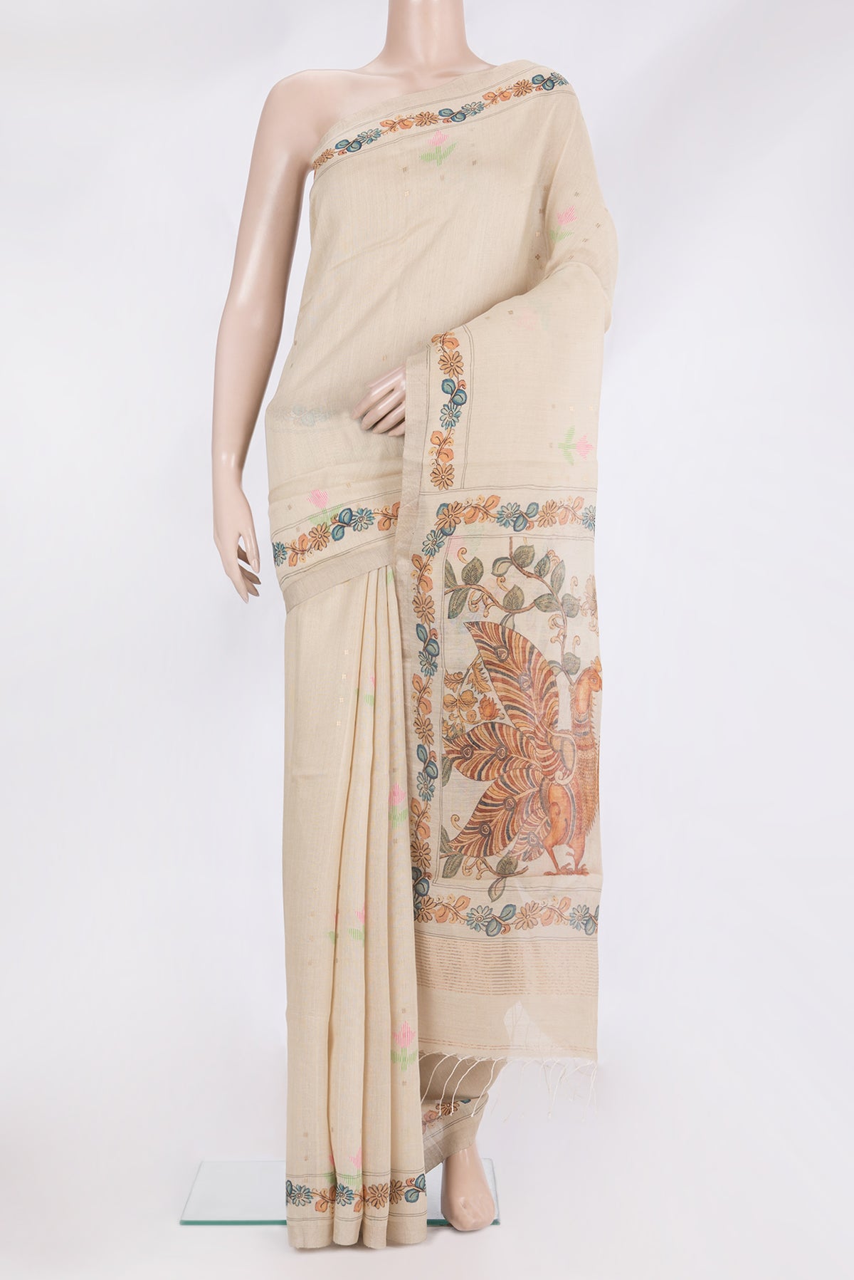 Pure Silk Beige Tussar Saree with Printed design on the body and Zari Border.  displayed on a mannequin