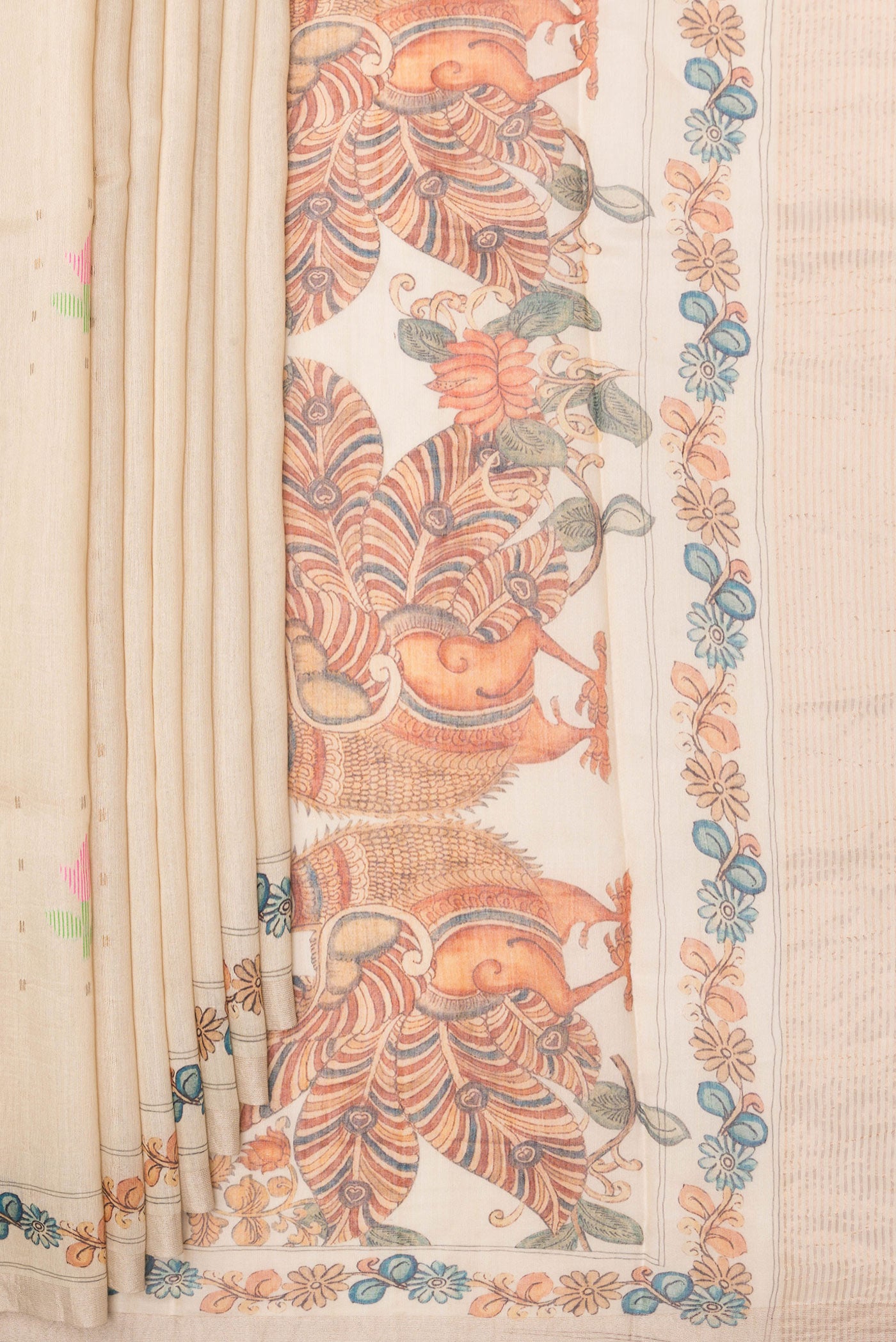 Pleats and pallu of Pure Silk Beige Tussar Saree with Printed design on the body and Zari Border. 