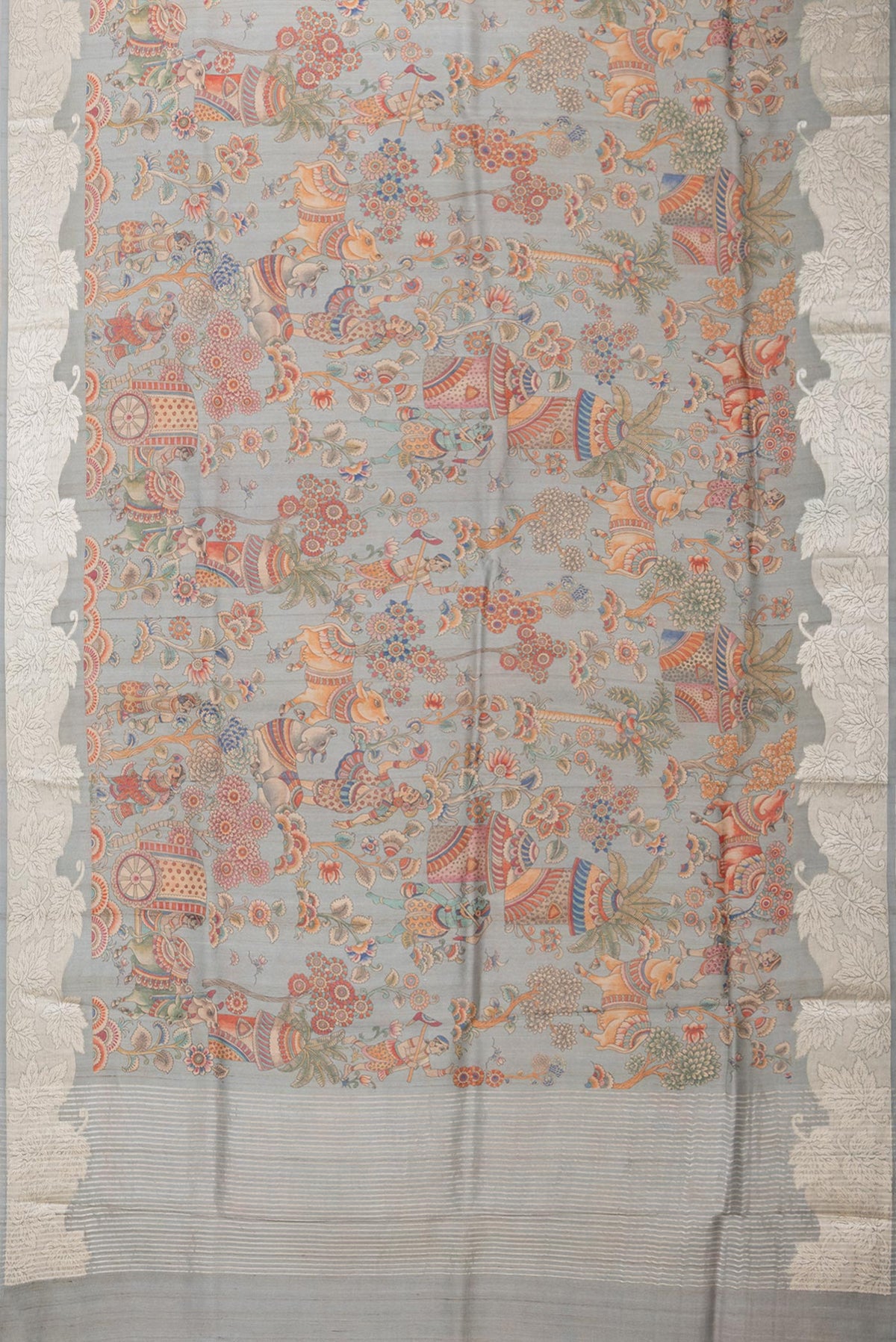 Flat view of Pure Silk Grey Tussar Saree with Printed design on the body and Fancy Border. 
