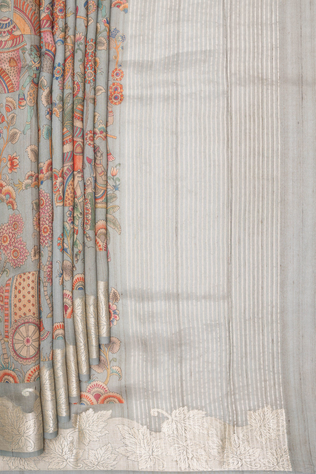 Pleats and pallu of Pure Silk Grey Tussar Saree with Printed design on the body and Fancy Border. 