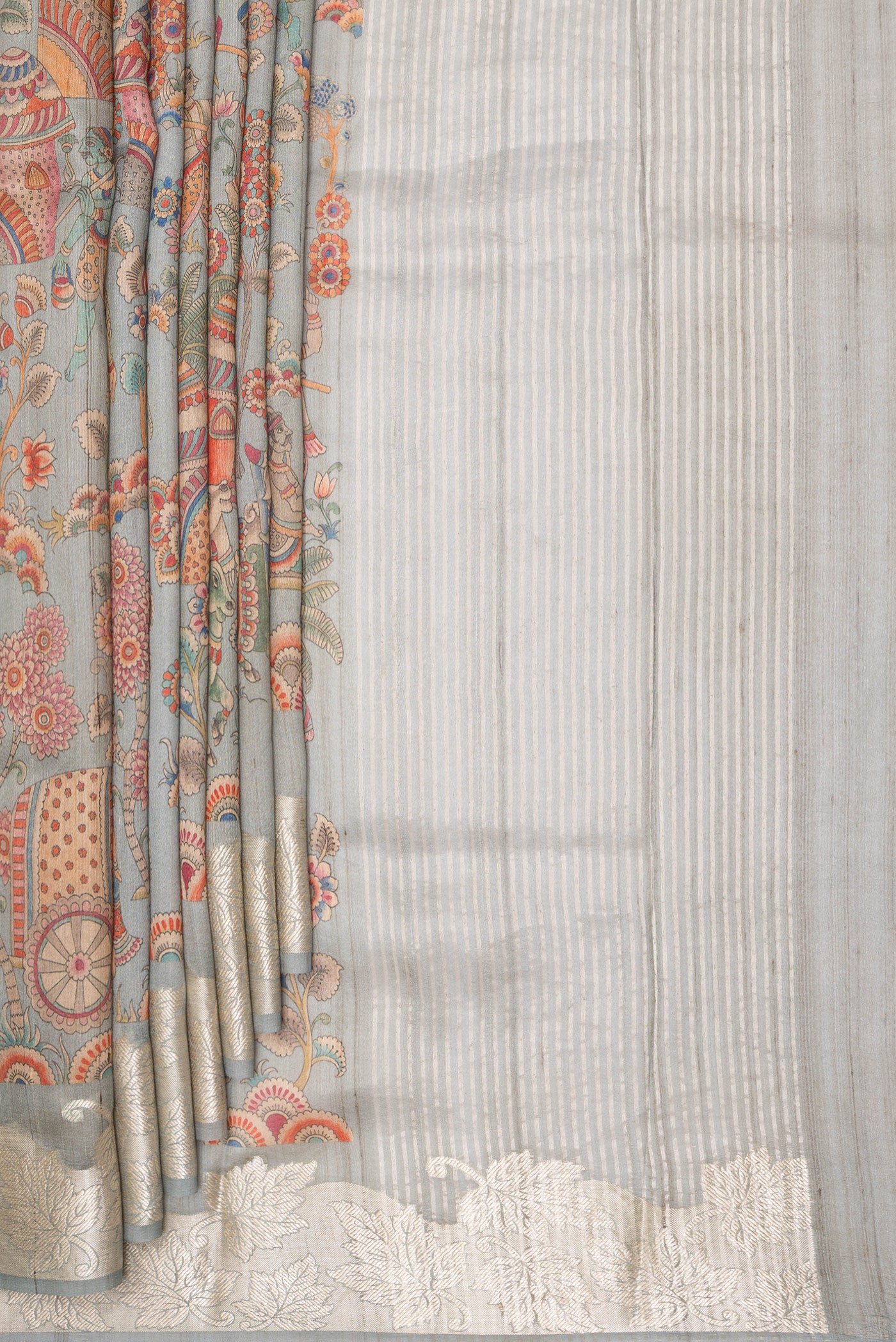 Pleats and pallu of Pure Silk Grey Tussar Saree with Printed design on the body and Fancy Border. 