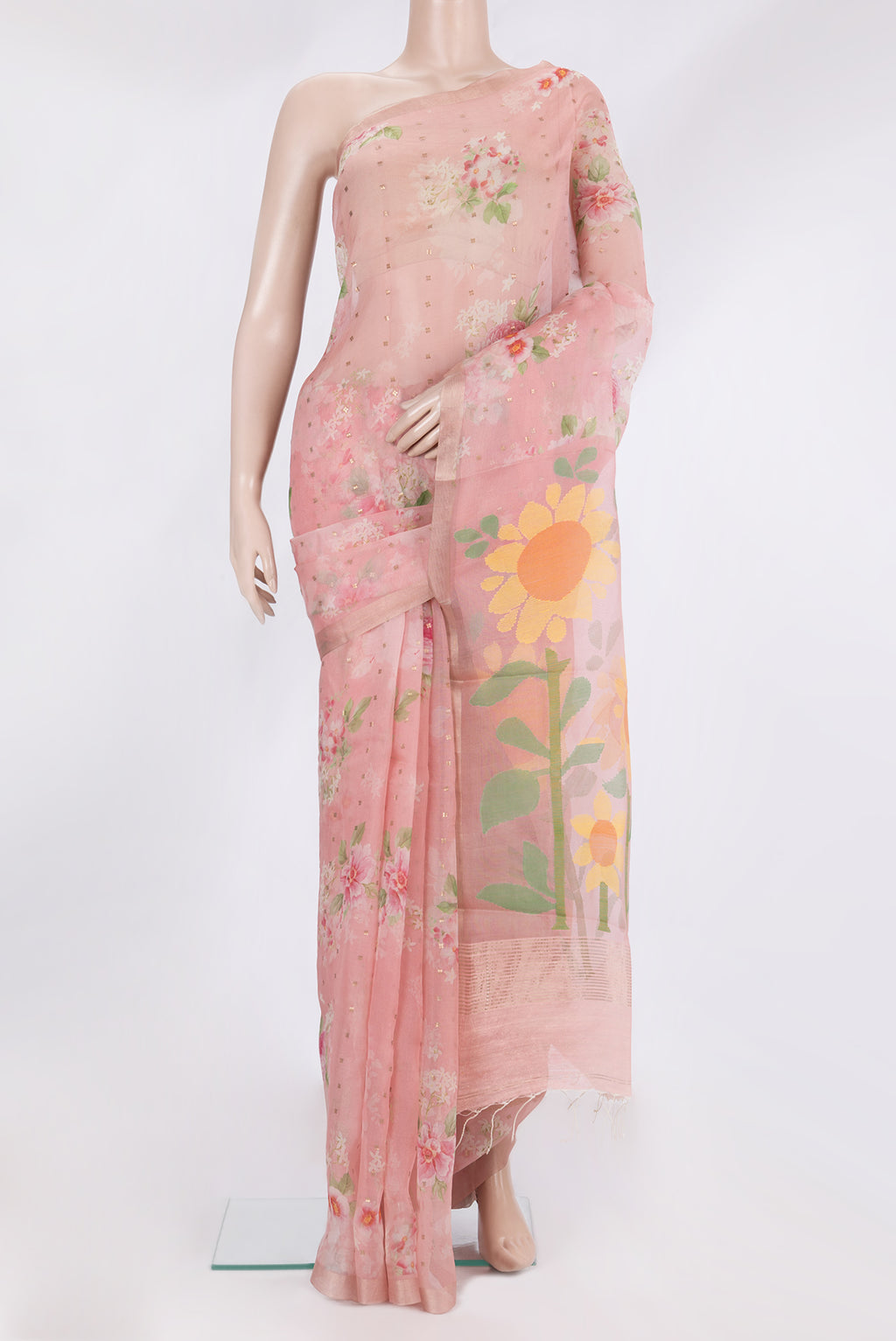 Pure Silk Pink Tussar Saree with Embroidery on the body and Zari Border.  displayed on a mannequin