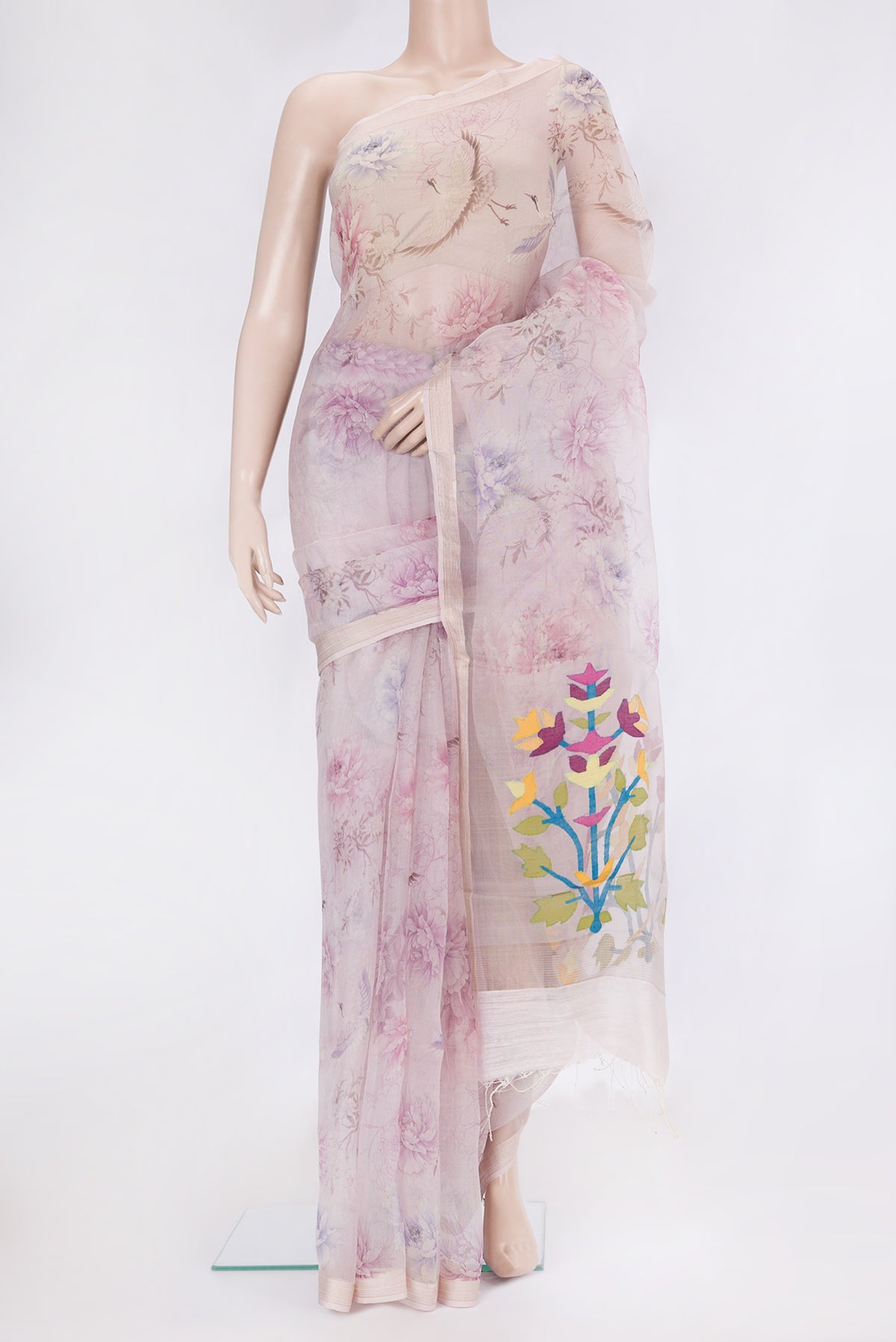 Lavender Organza Silk Saree with Printed design on the body and Zari Border.  displayed on a mannequin