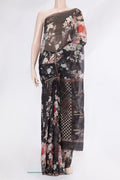 Black Organza Silk Saree with Floral Print on the body and Zari Border.  displayed on a mannequin