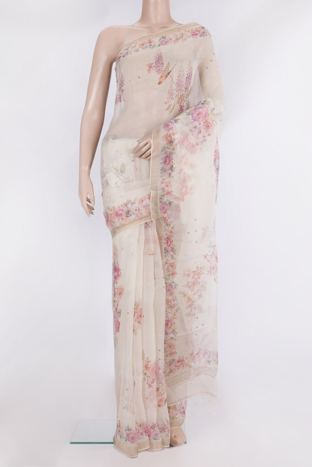 Pure Silk Off White Dual Tone Tussar Saree with Printed design on the body and Fancy Border.  displayed on a mannequin