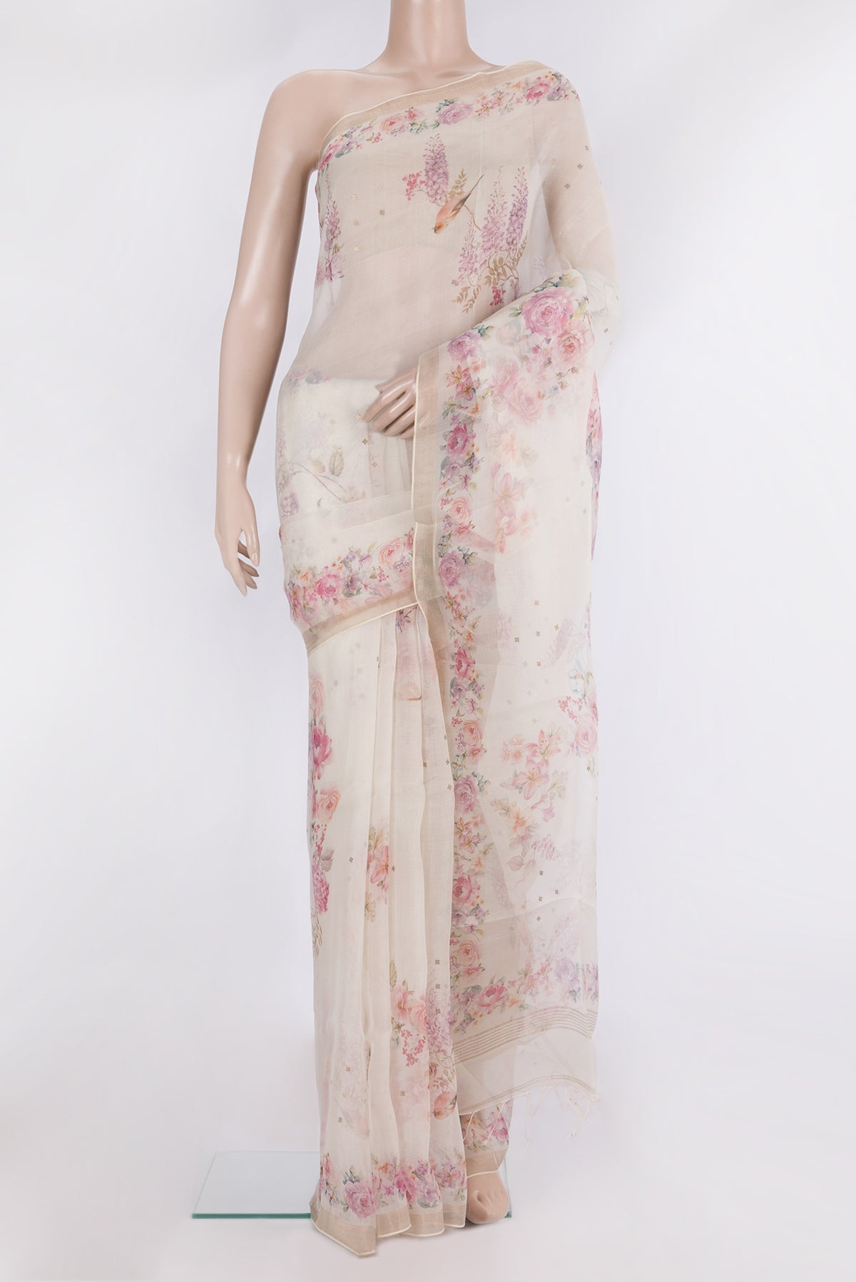 Pure Silk Off White Dual Tone Tussar Saree with Printed design on the body and Fancy Border.  displayed on a mannequin