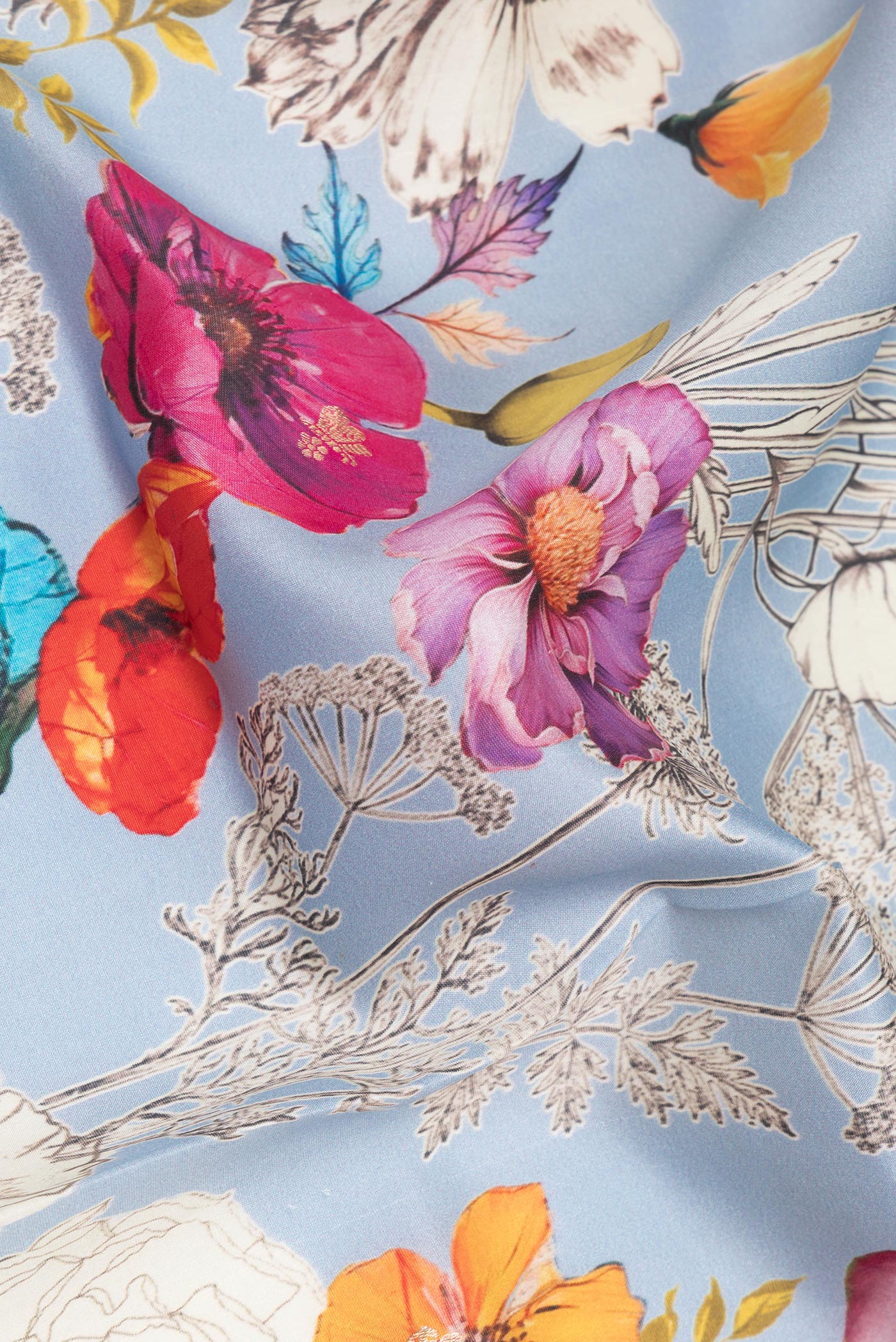 Close up of Pure Silk Sky Blue Tussar Saree with Zari Butta on the body and Fancy Border.  displaying folds
