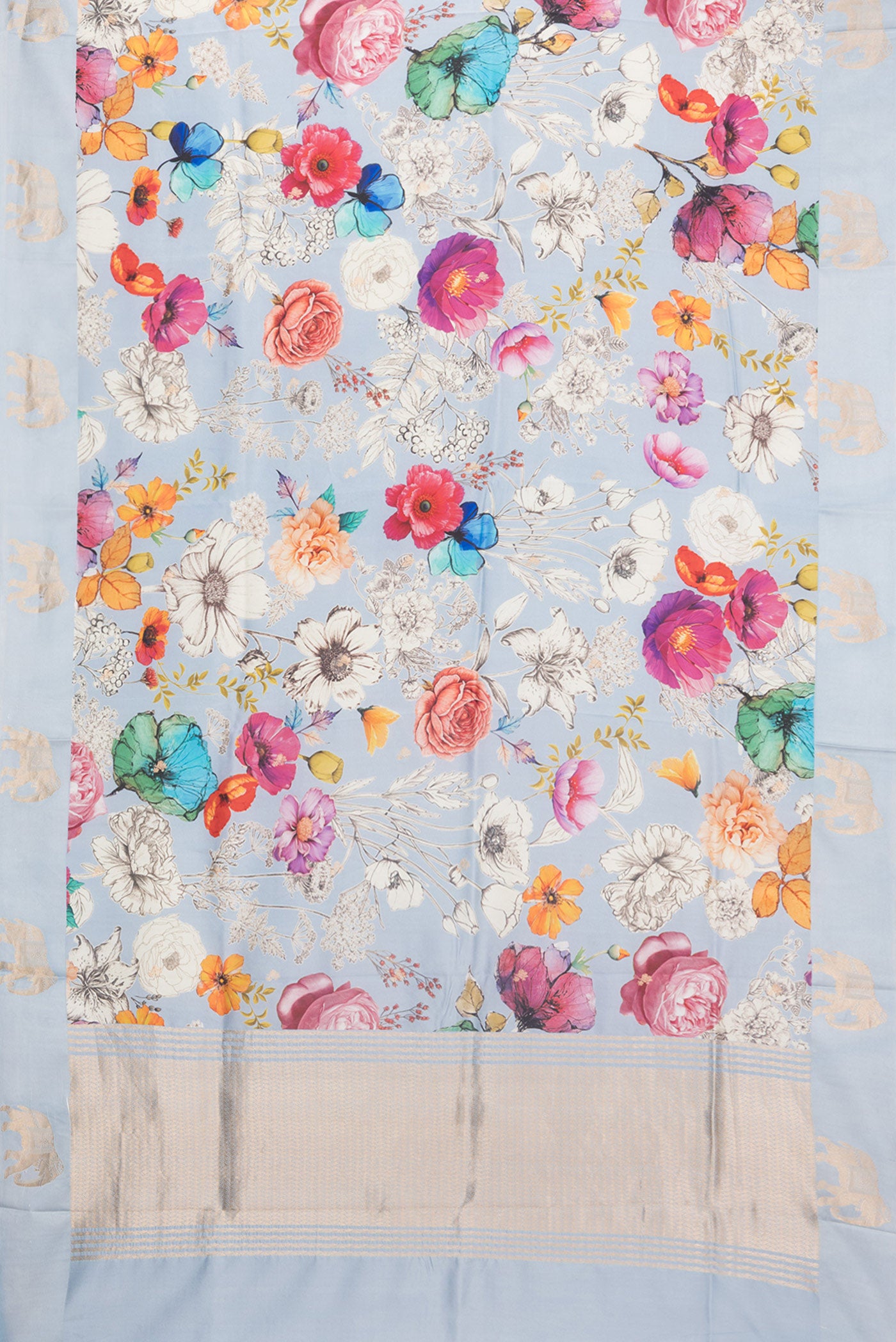 Flat view of Pure Silk Sky Blue Tussar Saree with Zari Butta on the body and Fancy Border. 