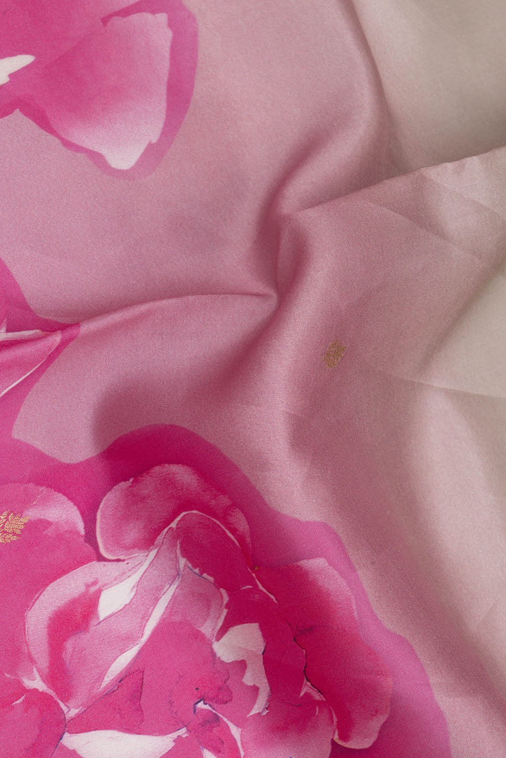 Close up of Pure Silk Grey Tussar Saree with Floral Print on the body and Fancy Border.  displaying folds
