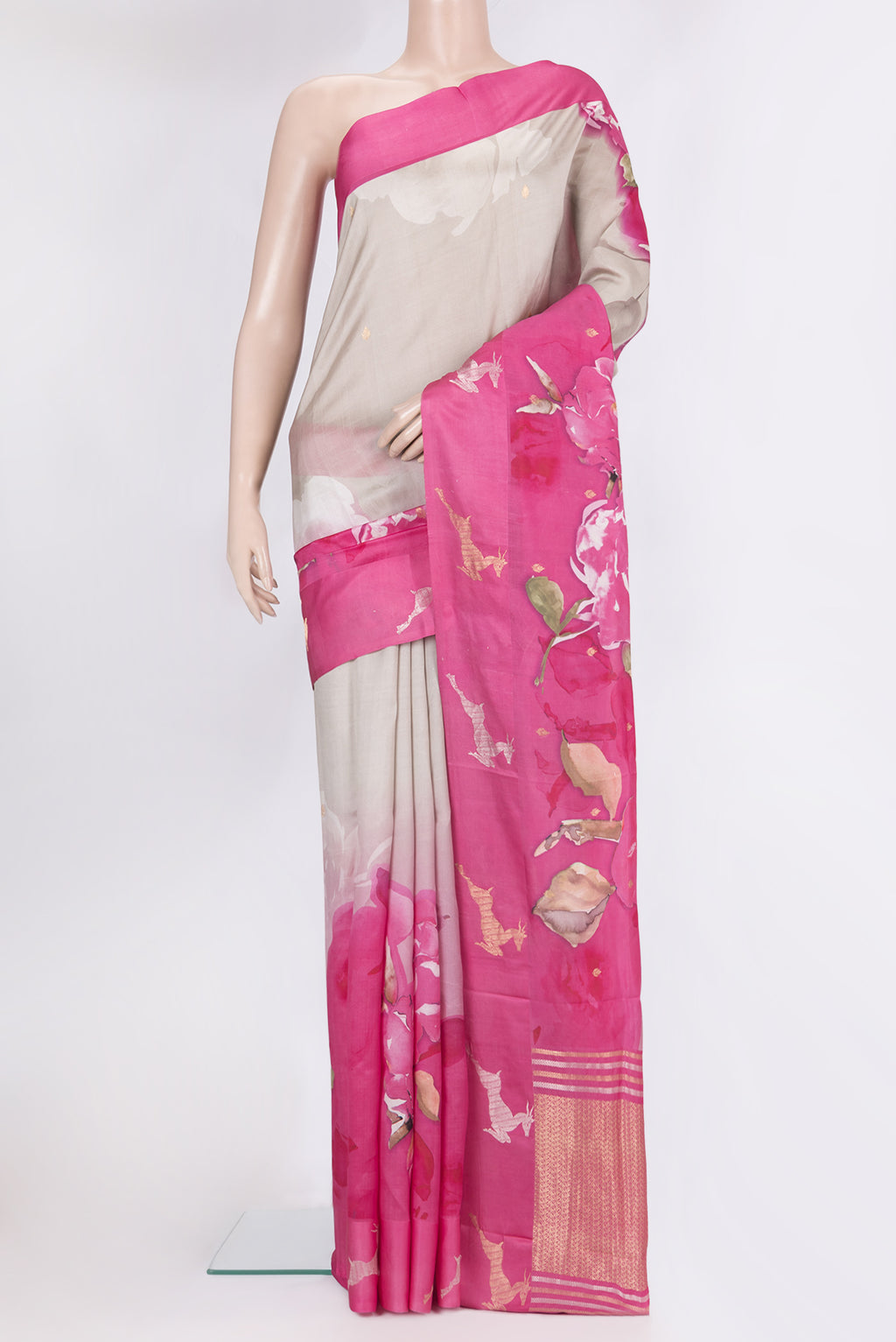 Pure Silk Grey Tussar Saree with Floral Print on the body and Fancy Border.  displayed on a mannequin