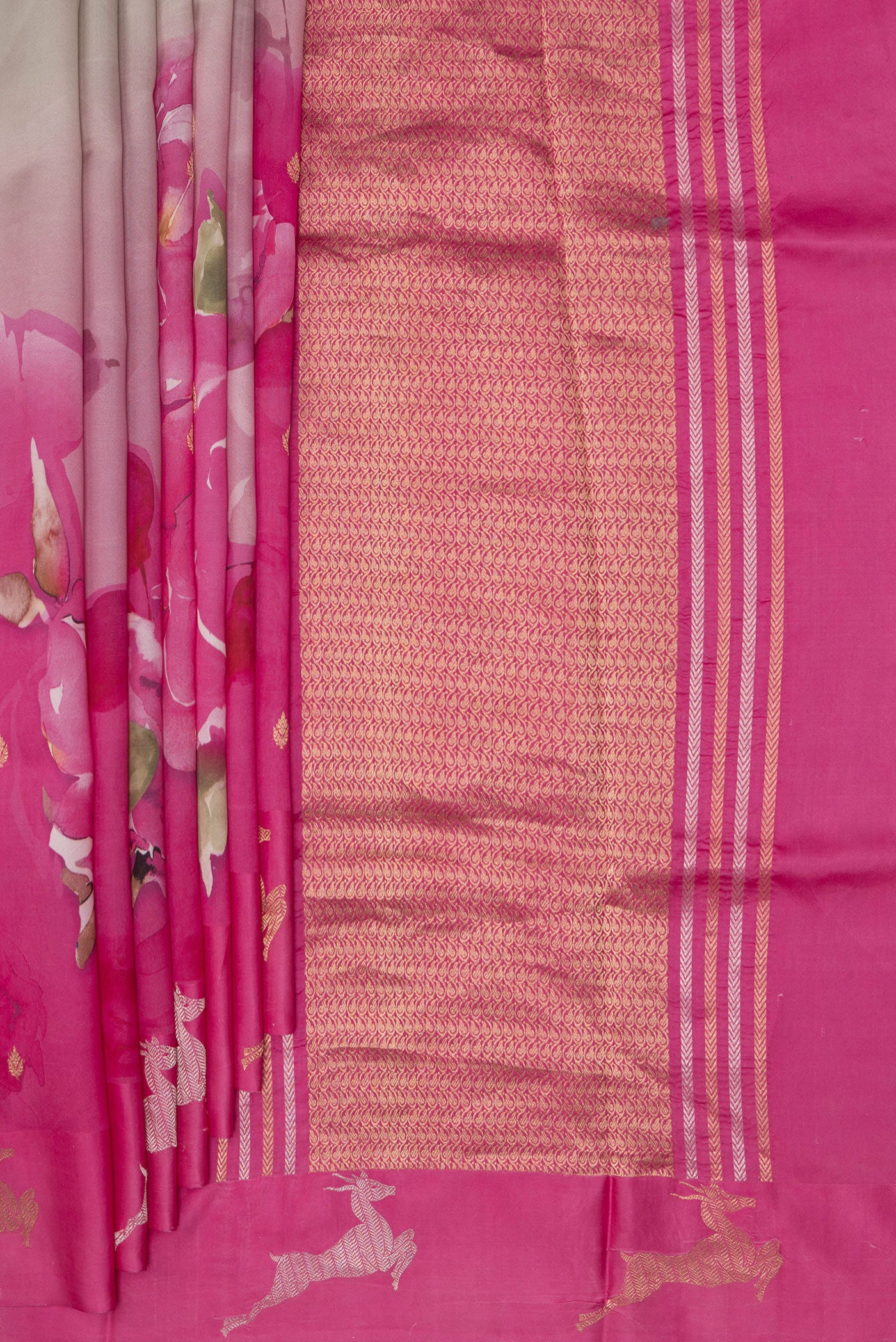Pleats and pallu of Pure Silk Grey Tussar Saree with Floral Print on the body and Fancy Border. 