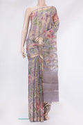 Lavender Organza Silk Saree with Stripes on the body and Zari Border.  displayed on a mannequin
