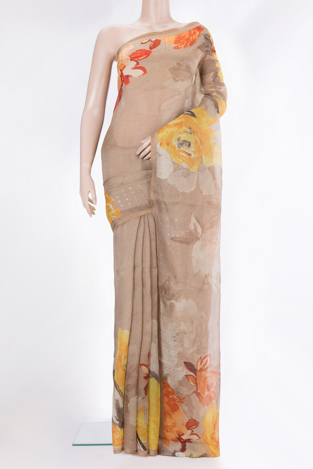 Dark Beige Tussar Saree with Floral Print on the body and Sequin Border.  displayed on a mannequin