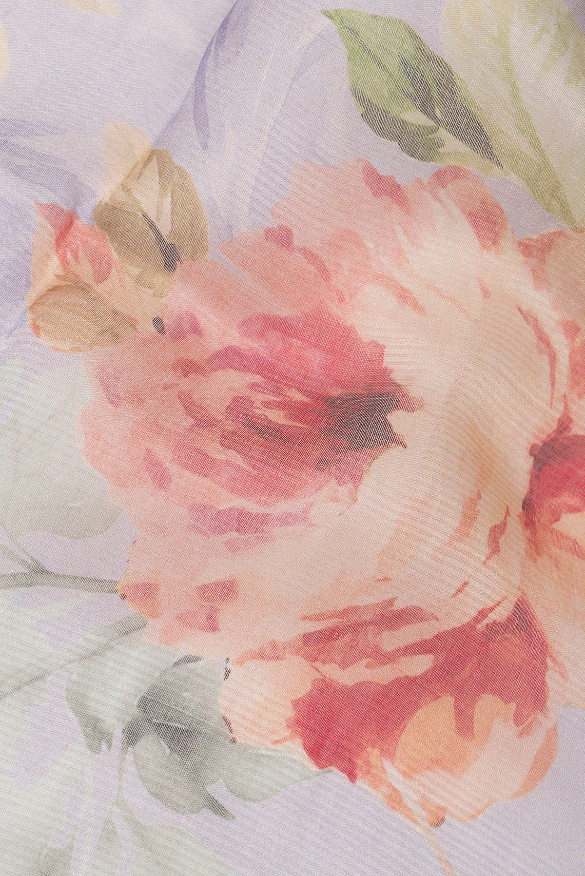 Close up of Lilac Tussar Saree with Printed design on the body and Sequin Border.  displaying folds