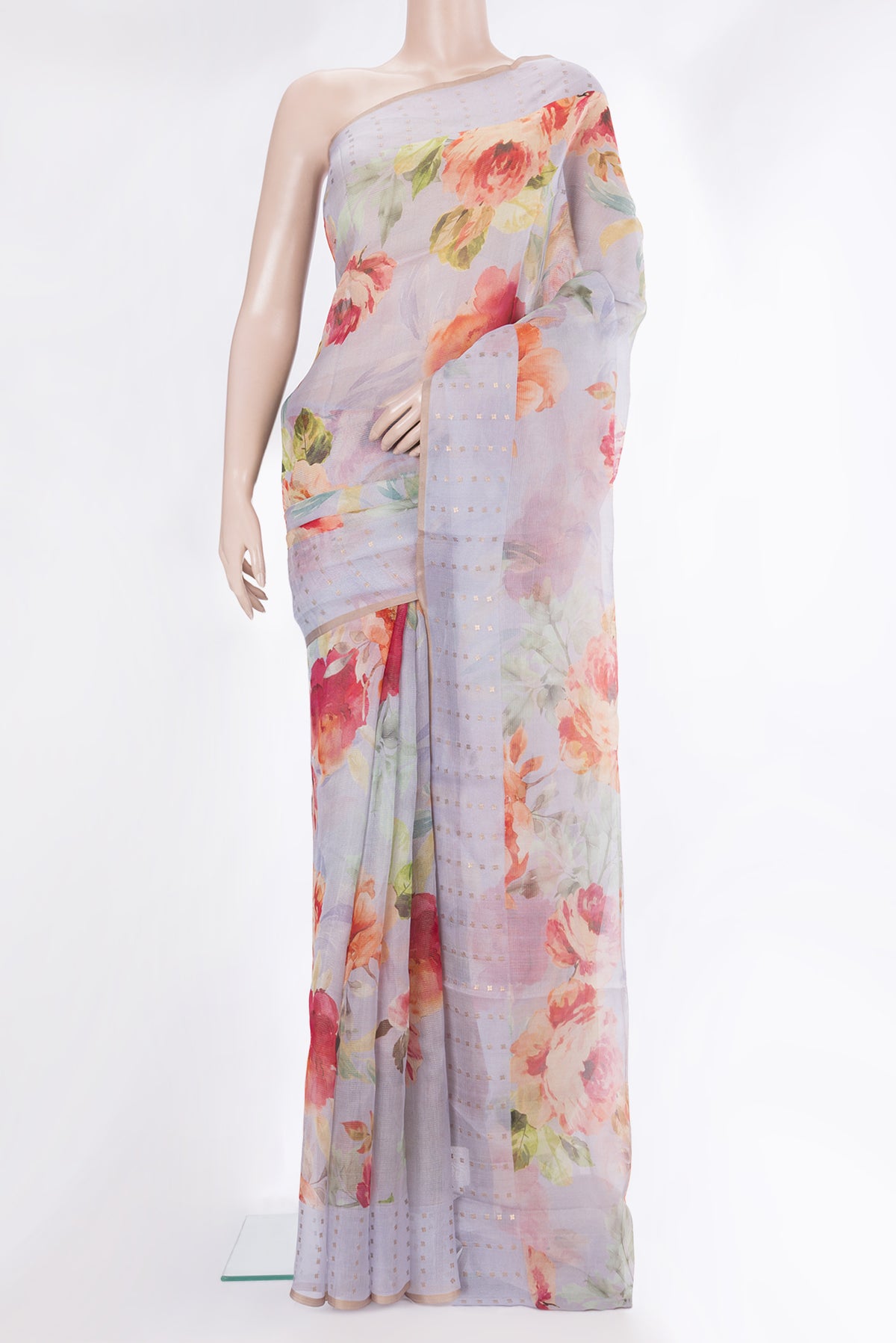Lilac Tussar Saree with Printed design on the body and Sequin Border.  displayed on a mannequin