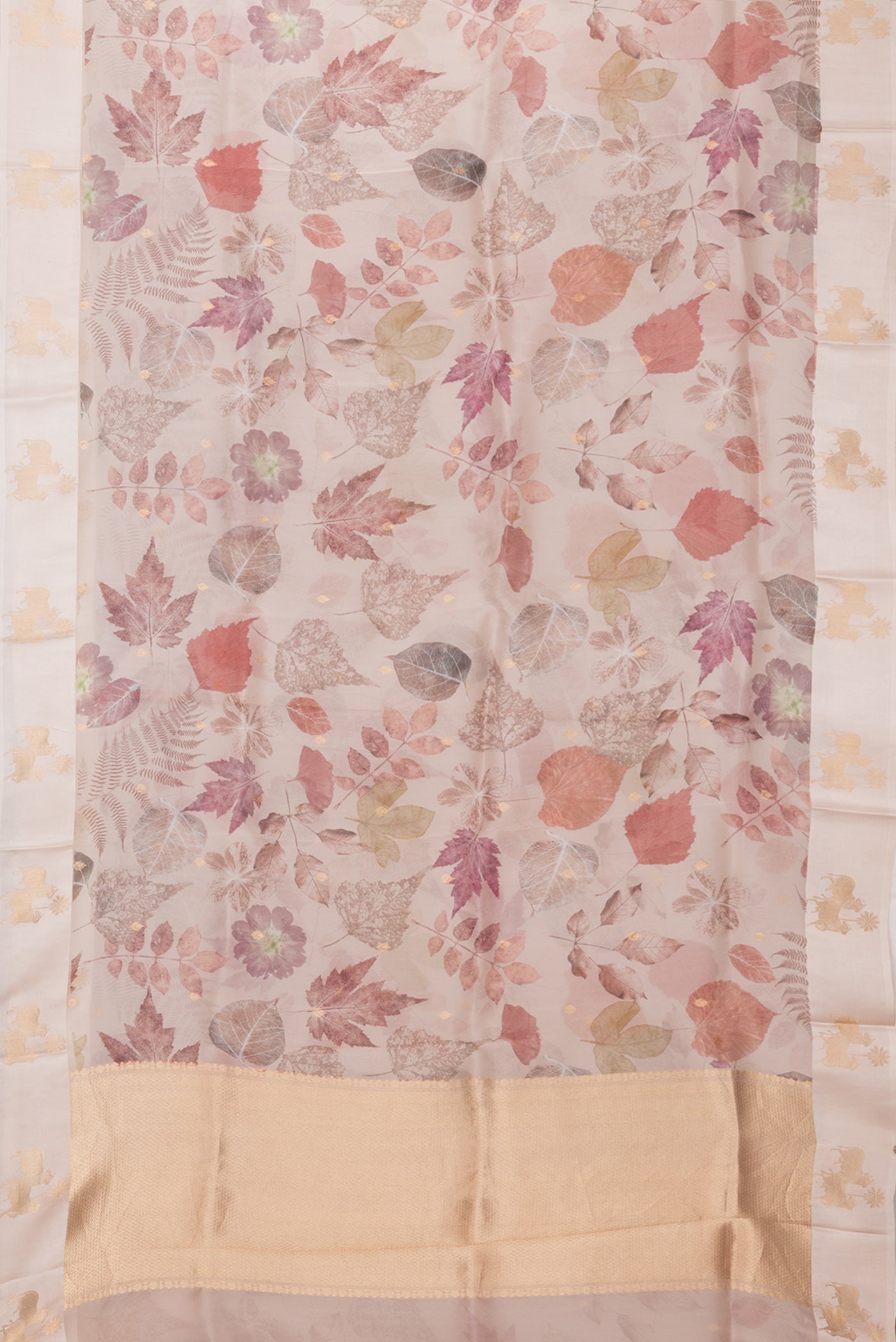 Flat view of Rose Gold Organza Silk Saree with Floral Print on the body and Fancy Border. 
