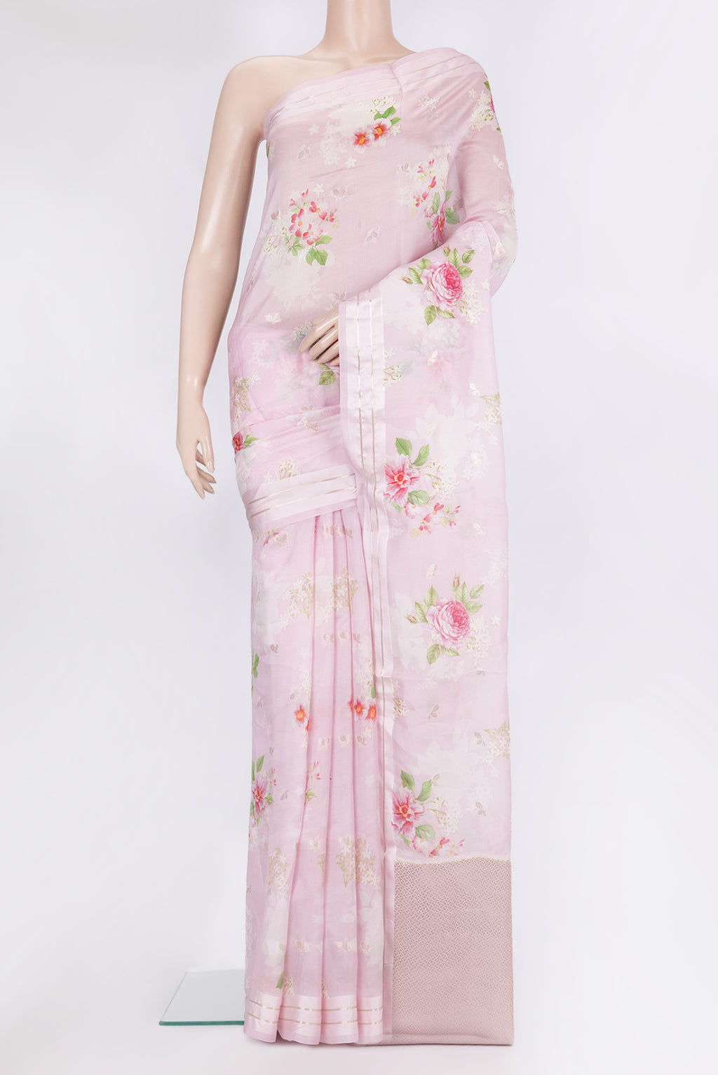 Pure Silk Lavender Tussar Saree with Floral Print on the body and Zari Border.  displayed on a mannequin
