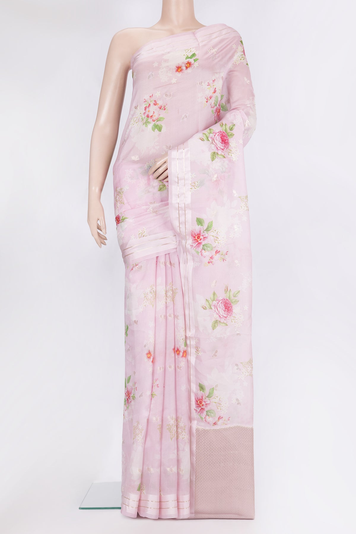 Pure Silk Lavender Tussar Saree with Floral Print on the body and Zari Border.  displayed on a mannequin