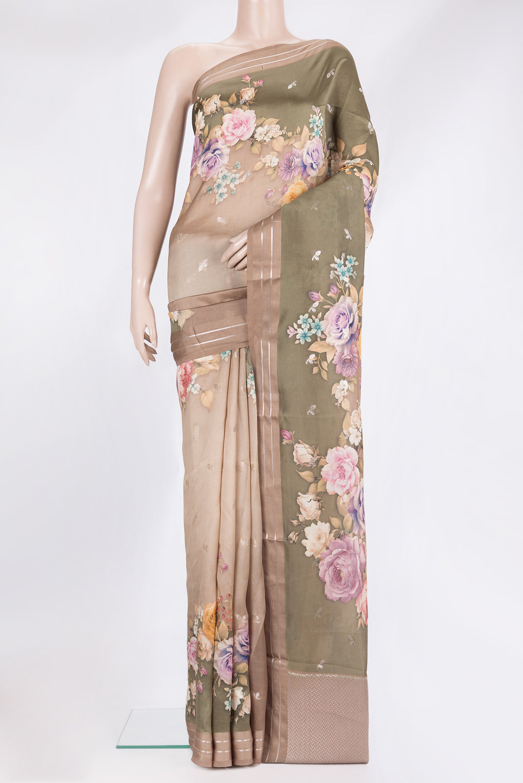 Pure Silk Brown Tussar Saree with Floral Print on the body and Zari Border.  displayed on a mannequin