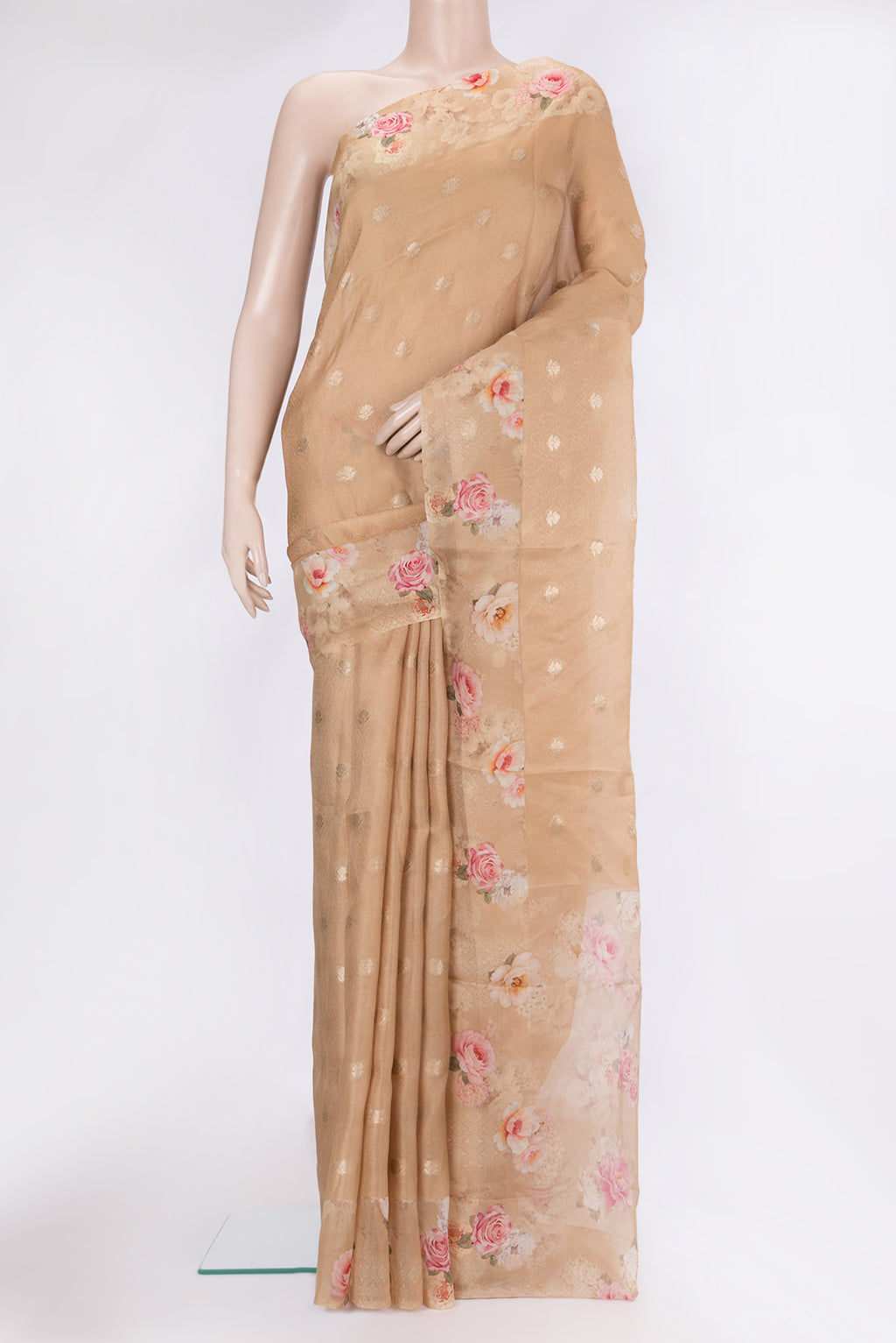 Beige Organza Silk Saree with Jacquard With Zari Butta on the body and Fancy Border.  displayed on a mannequin