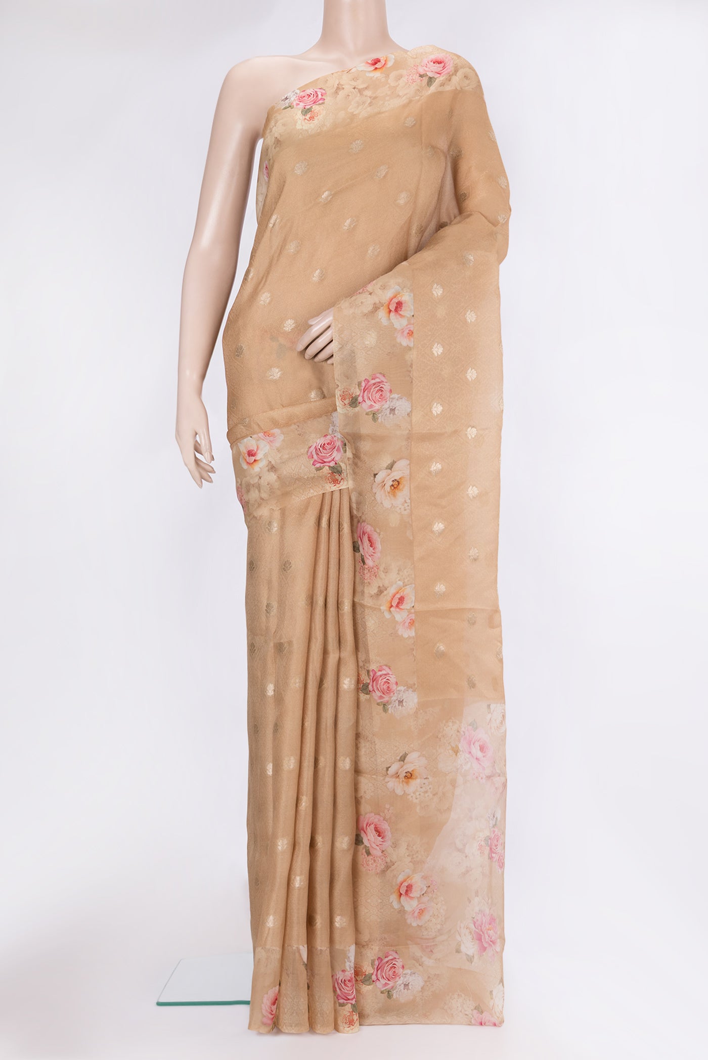Beige Organza Silk Saree with Jacquard With Zari Butta on the body and Fancy Border.  displayed on a mannequin