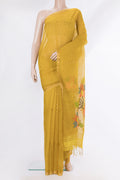 Yellow Tussar Saree with Embroidery on the body and Zari Border.  displayed on a mannequin