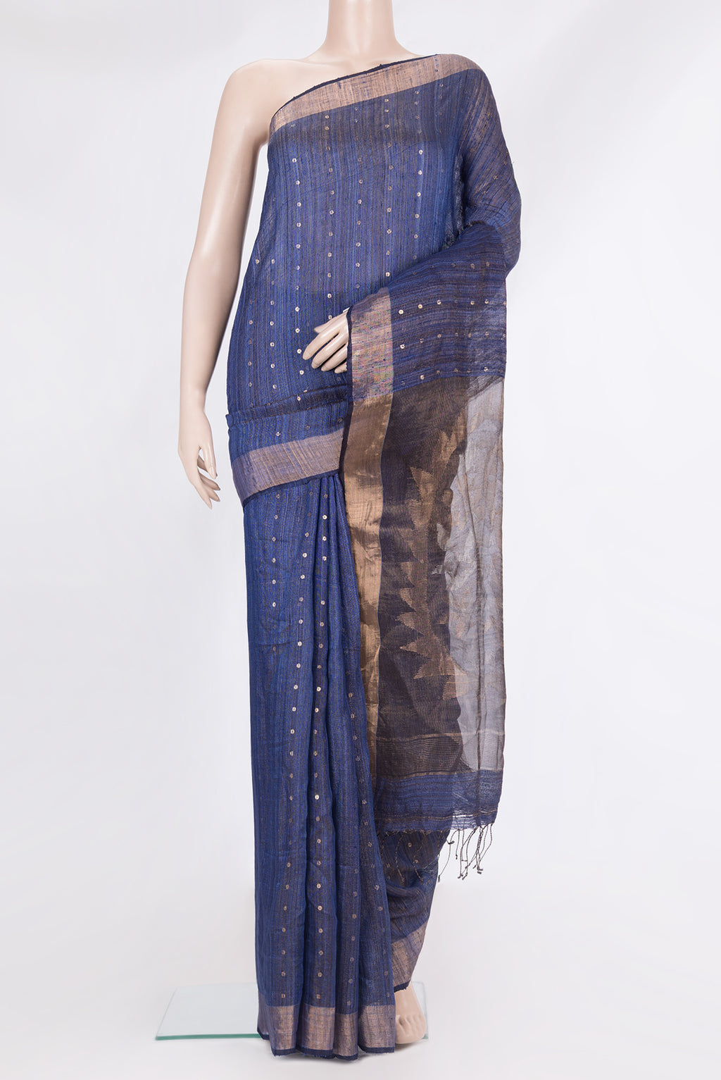 Pure Silk Dark Blue Tussar Saree with Embroidery on the body and Zari Border.  displayed on a mannequin