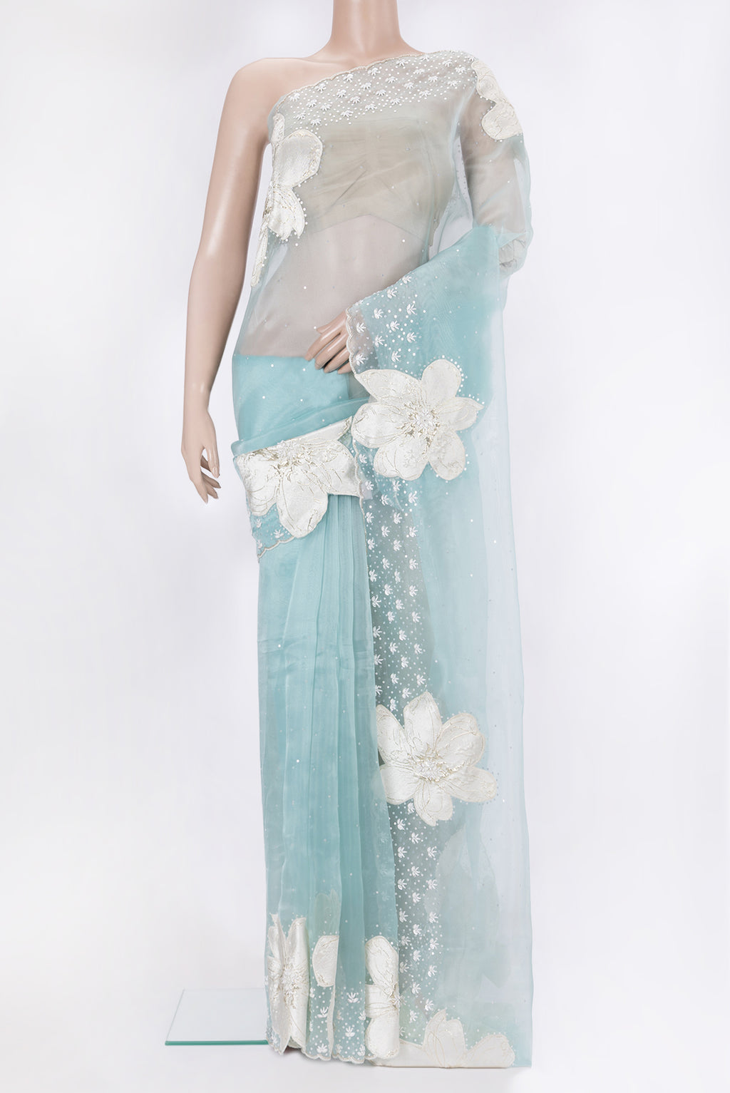 Sky Blue Dual Tone Organza Saree with Embroidery on the body and Embroidery Border.  displayed on a mannequin