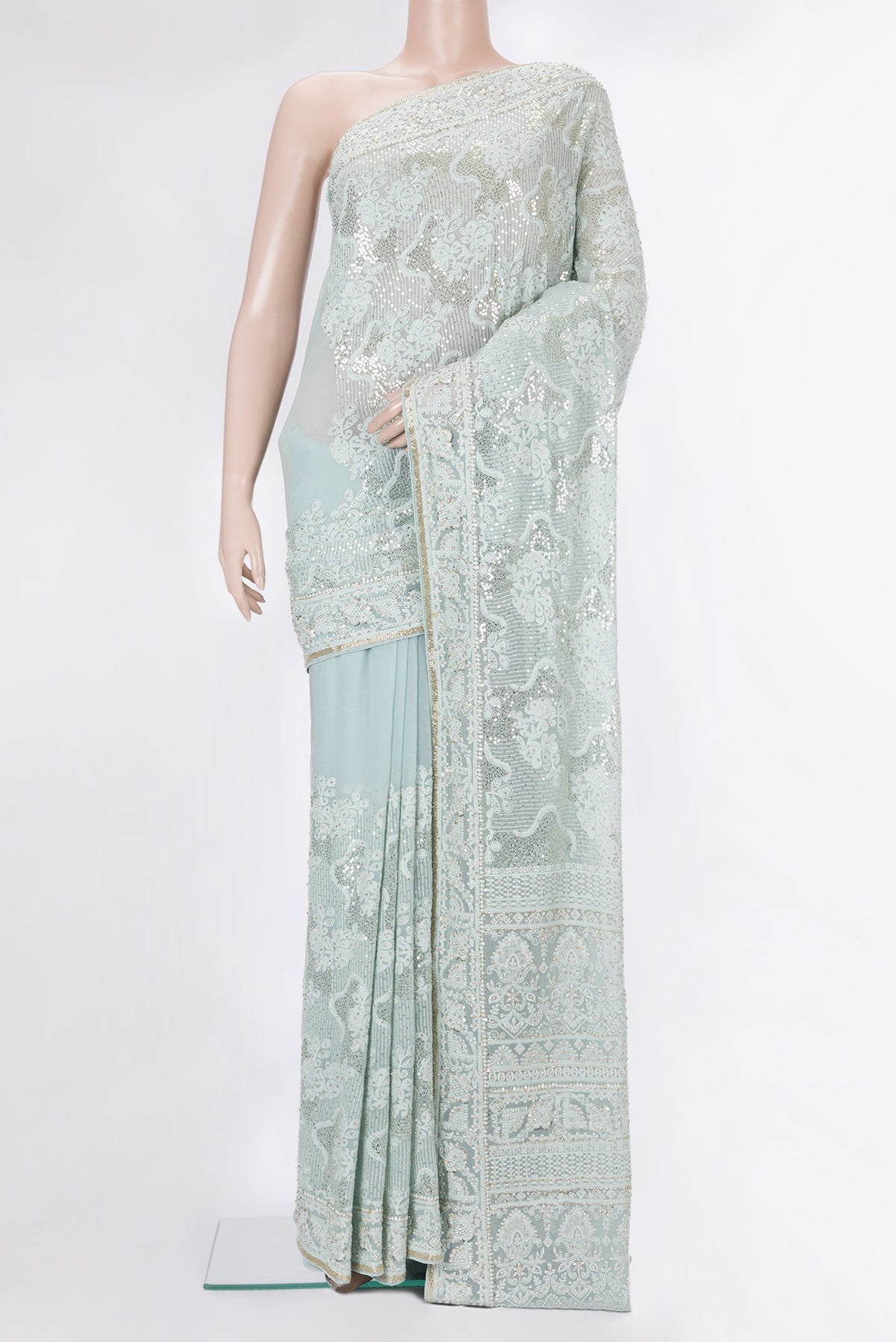 Light Blue Dual Tone Georgette Saree with Embroidery on the body and Sequin Border.  displayed on a mannequin