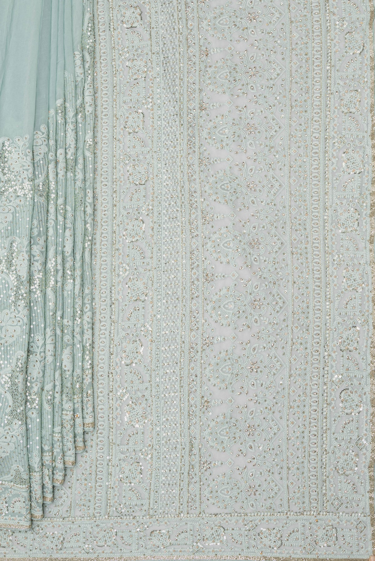 Pleats and pallu of Light Blue Dual Tone Georgette Saree with Embroidery on the body and Sequin Border. 