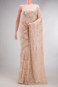 Peach Dual Tone Mysore Georgette Saree with Embroidered on the body and Sequin Border.  displayed on a mannequin