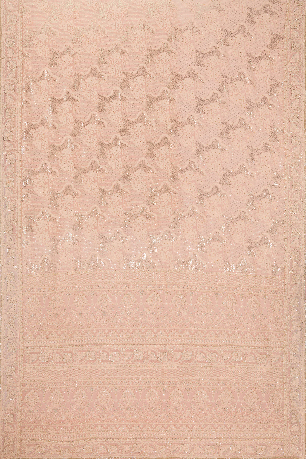 Flat view of Peach Dual Tone Mysore Georgette Saree with Embroidered on the body and Sequin Border. 