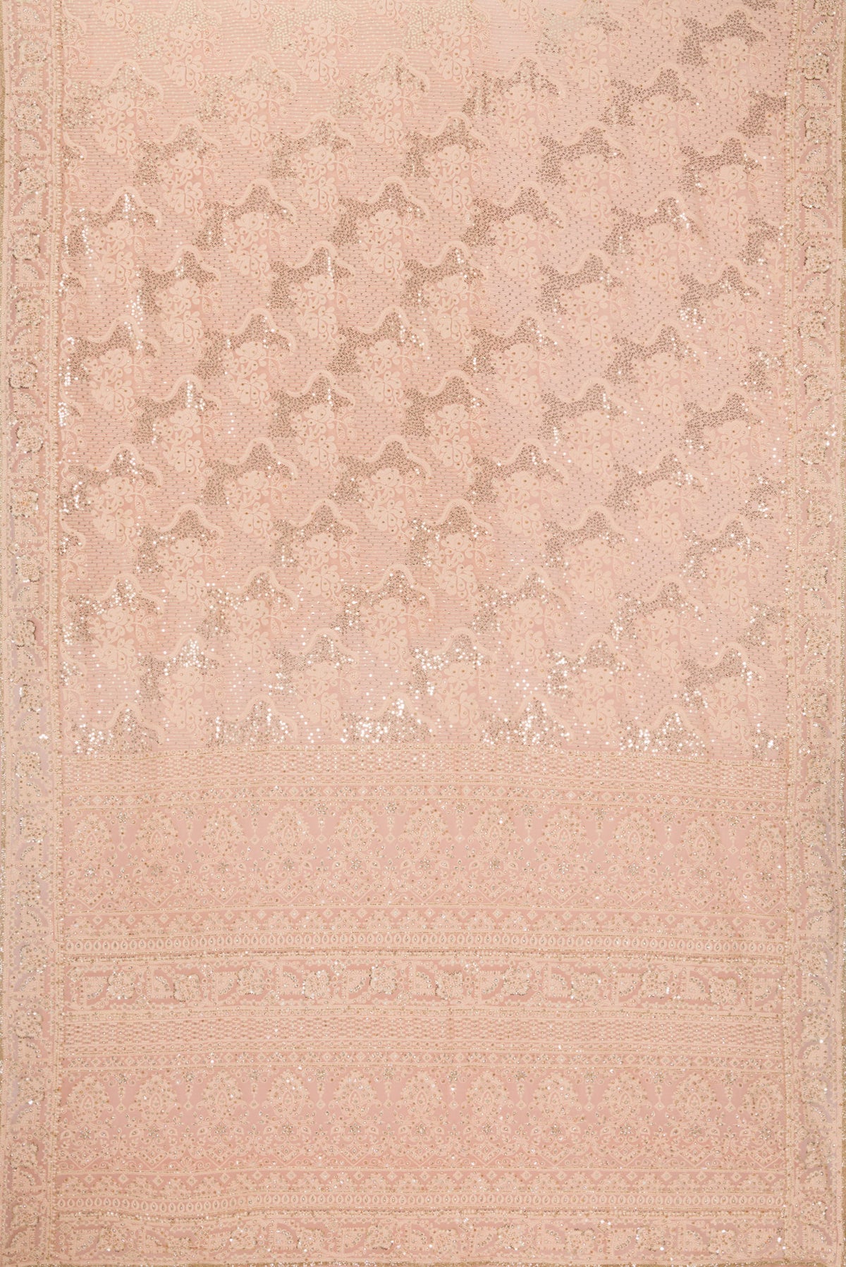 Flat view of Peach Dual Tone Mysore Georgette Saree with Embroidered on the body and Sequin Border. 