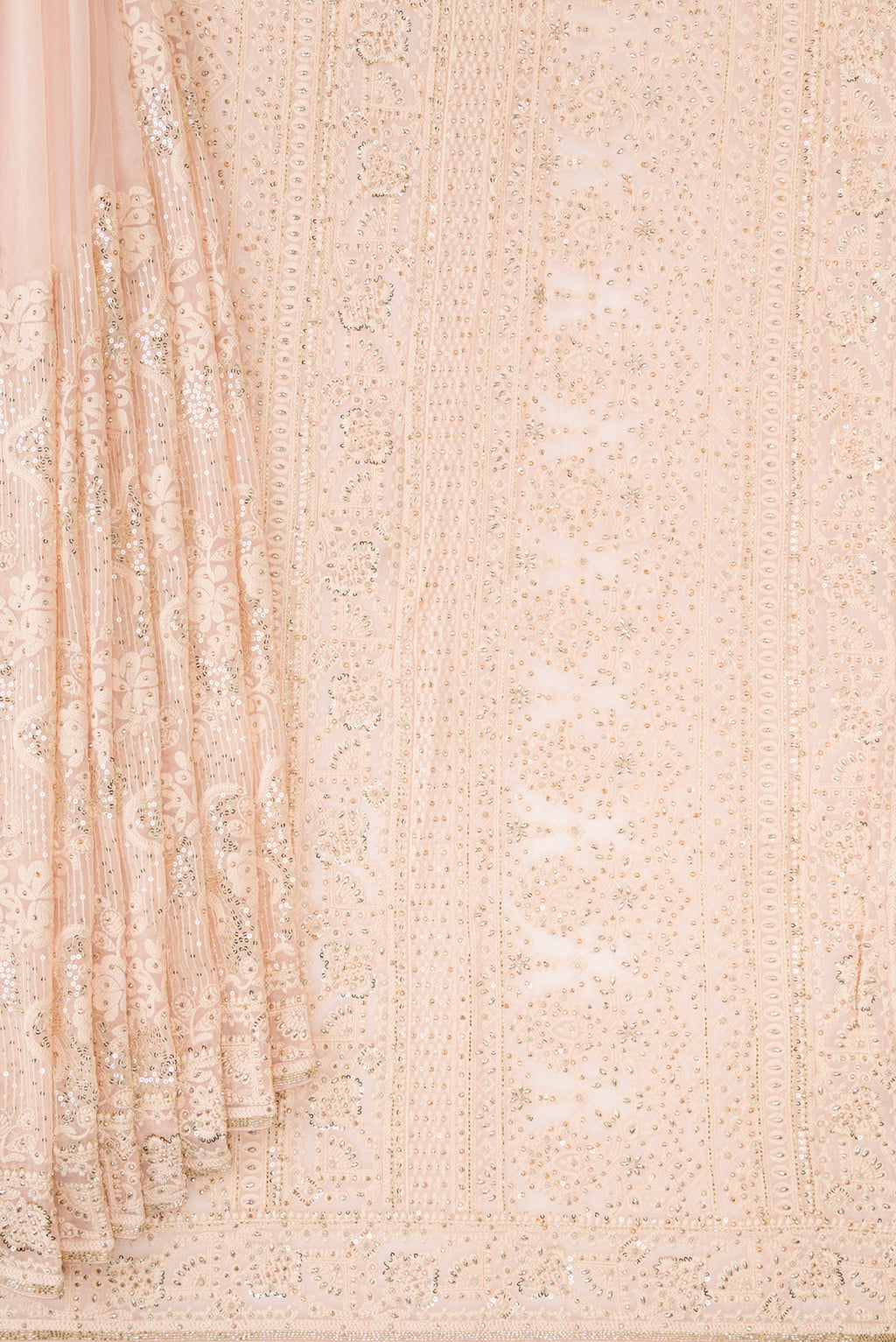 Pleats and pallu of Peach Dual Tone Mysore Georgette Saree with Embroidered on the body and Sequin Border. 