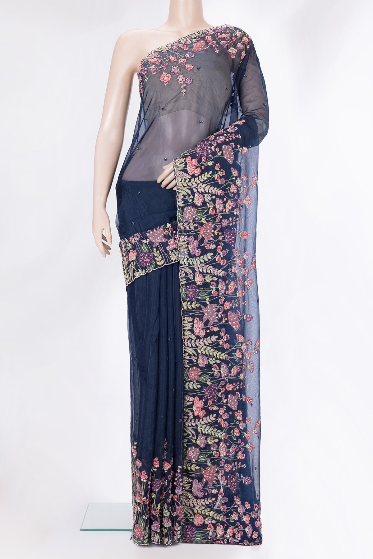 Pure Silk Navy Blue Dual Tone Organza Saree with Embroidery on the body and Sequin Border.  displayed on a mannequin