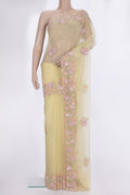 Lemon Yellow Organza Saree with Embroidered on the body and Sequin Border.  displayed on a mannequin