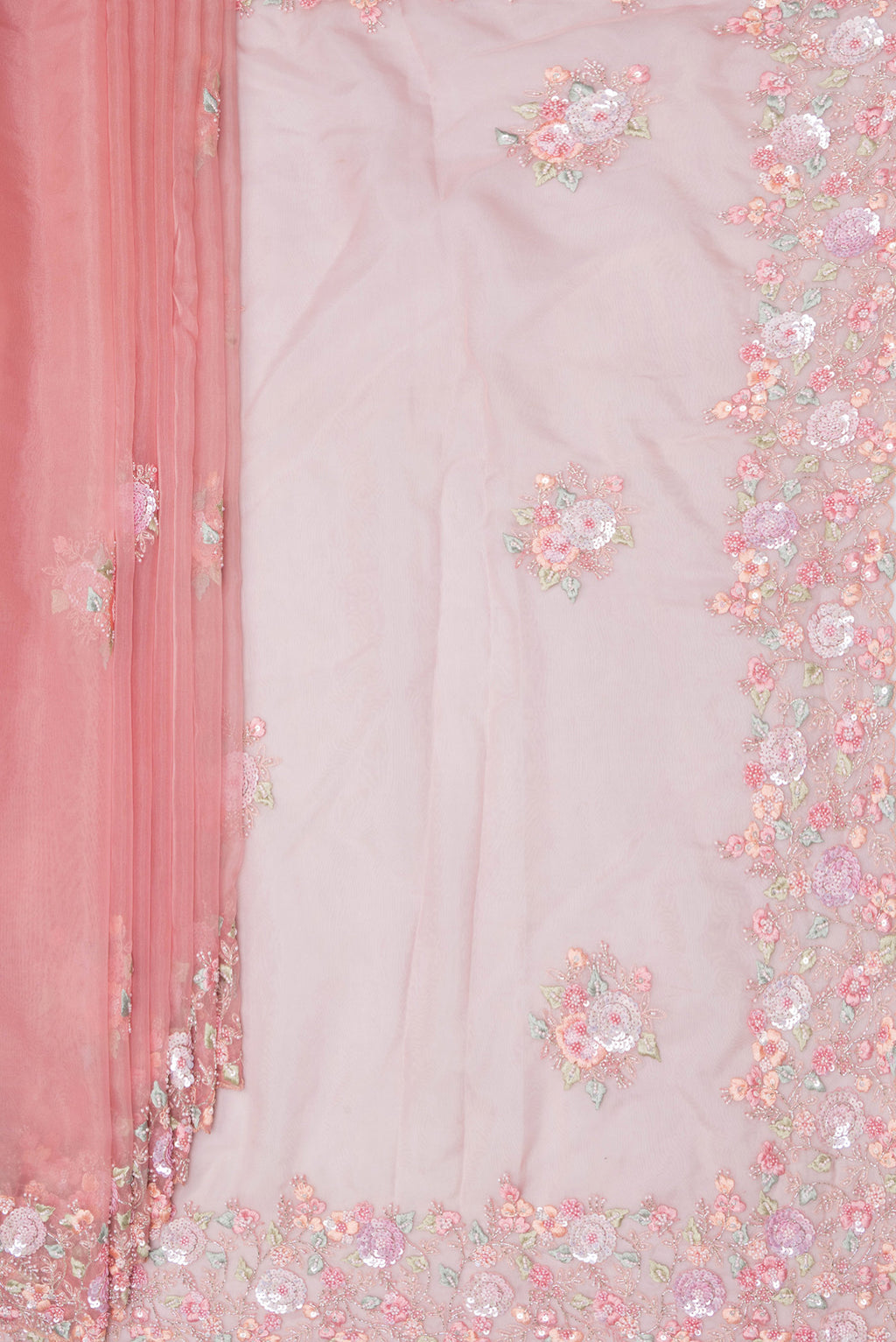 Pleats and pallu of Pure Silk Pink Dual Tone Organza Saree with Embroidery on the body and Sequin Border. 