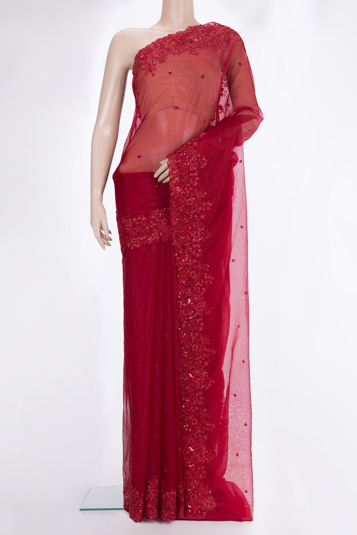 Red Organza Saree with Embroidered on the body and Sequin Border.  displayed on a mannequin