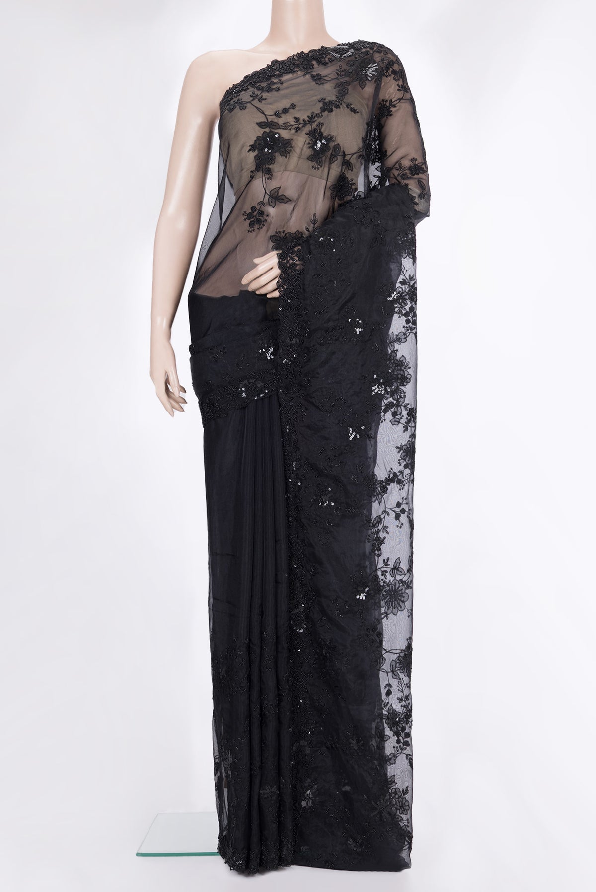 Pure Silk Black Organza Saree with Embroidered on the body and Embroidered Border.  displayed on a mannequin