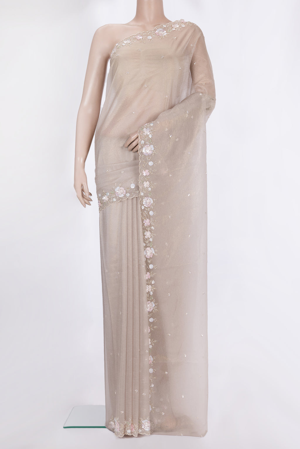 Beige Dual Tone Organza Saree with Embroidered on the body and Embroidered Border.  displayed on a mannequin