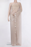 Beige Dual Tone Organza Saree with Embroidered on the body and Embroidered Border.  displayed on a mannequin