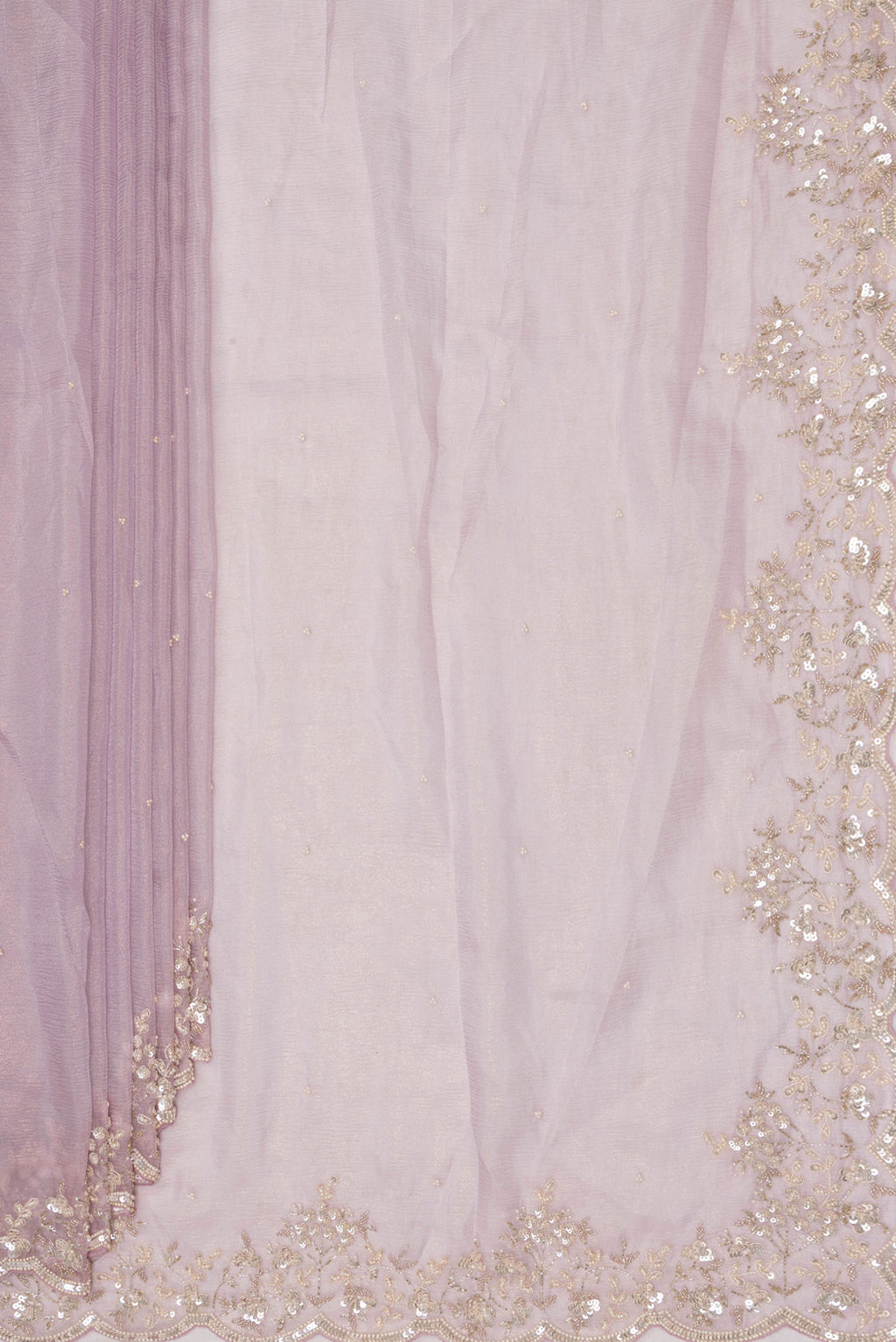 Pleats and pallu of Lavender Dual Tone Organza Saree with Embroidered on the body and Embroidered Border. 