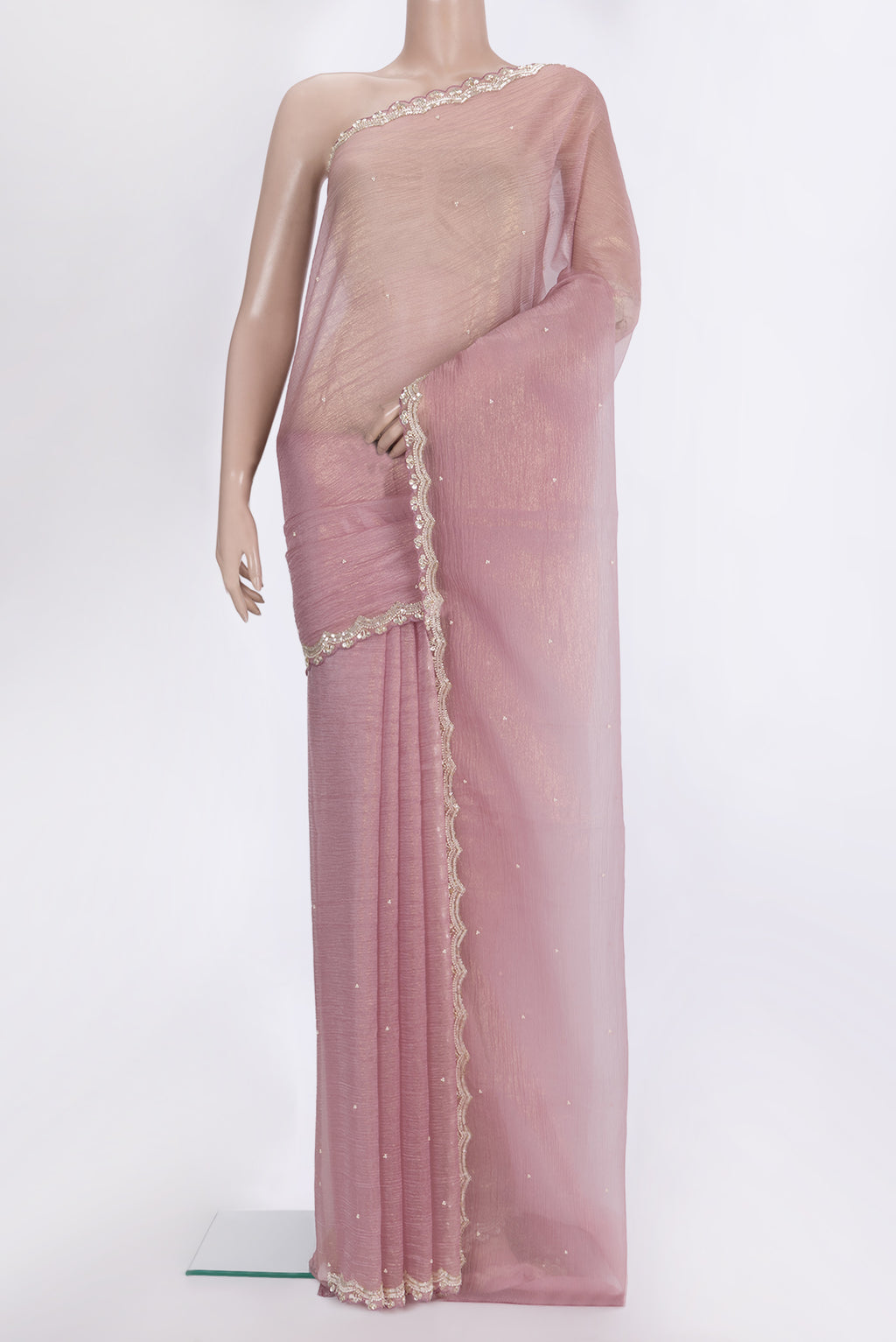 Rose Gold Dual Tone Organza Saree with Embroidered on the body and Embroidered Border.  displayed on a mannequin