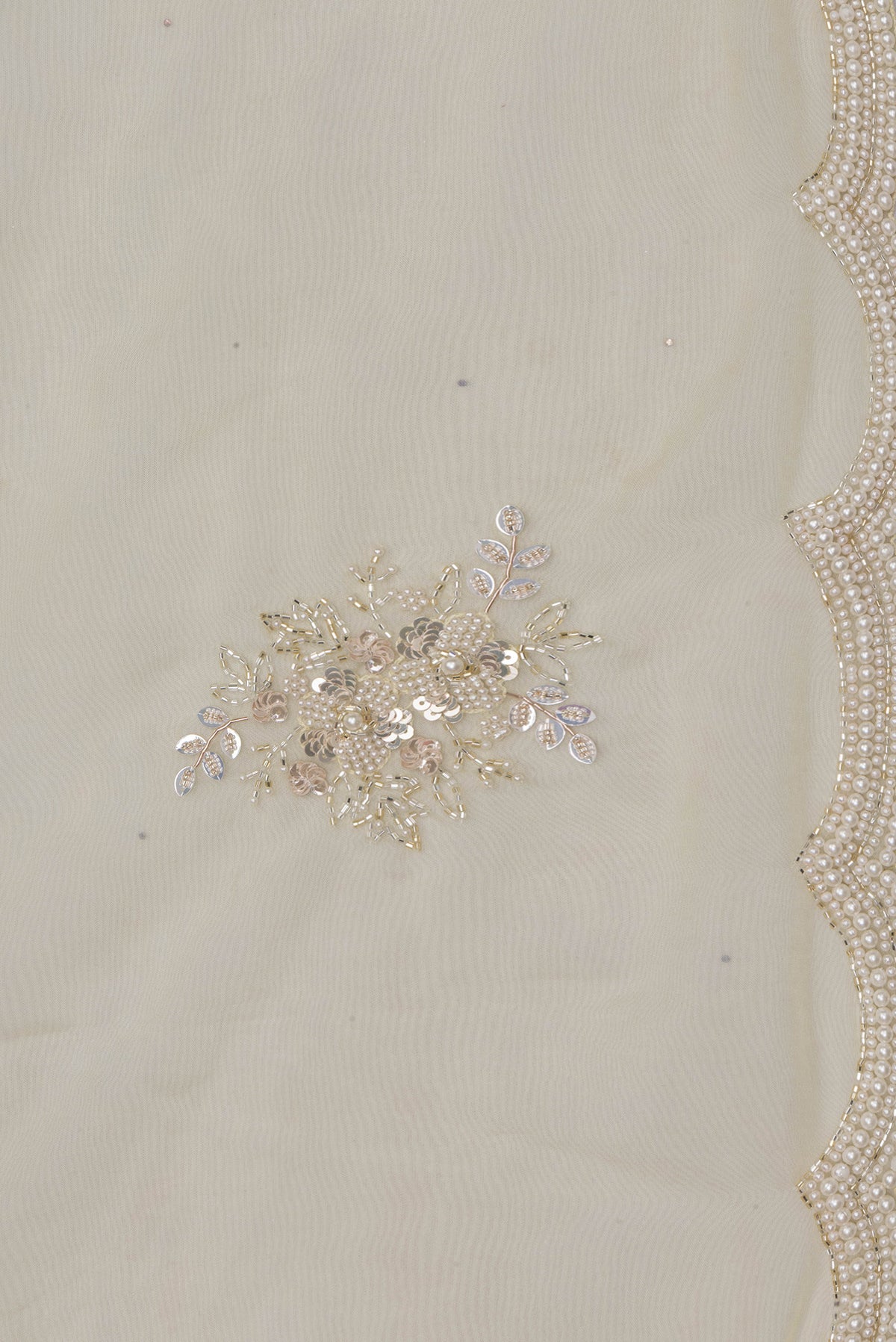 Border image of Pure Silk Sandal Dual Tone Organza Saree with Embroidery on the body and Sequin Border. 