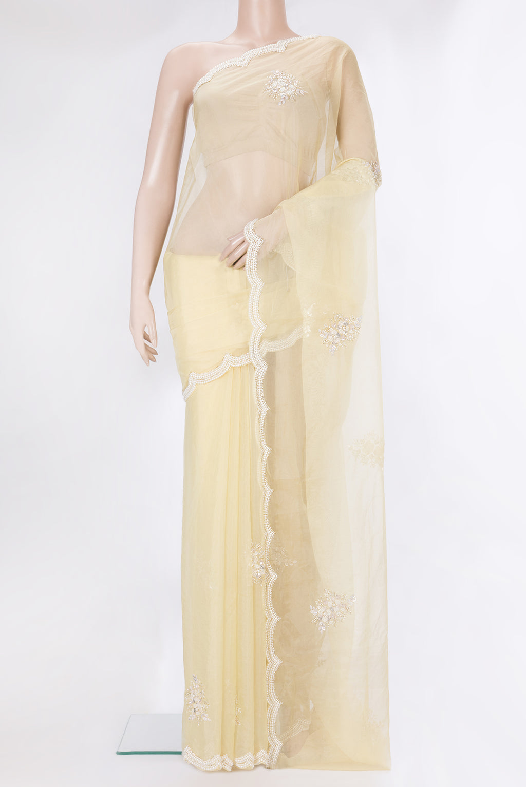 Pure Silk Sandal Dual Tone Organza Saree with Embroidery on the body and Sequin Border.  displayed on a mannequin