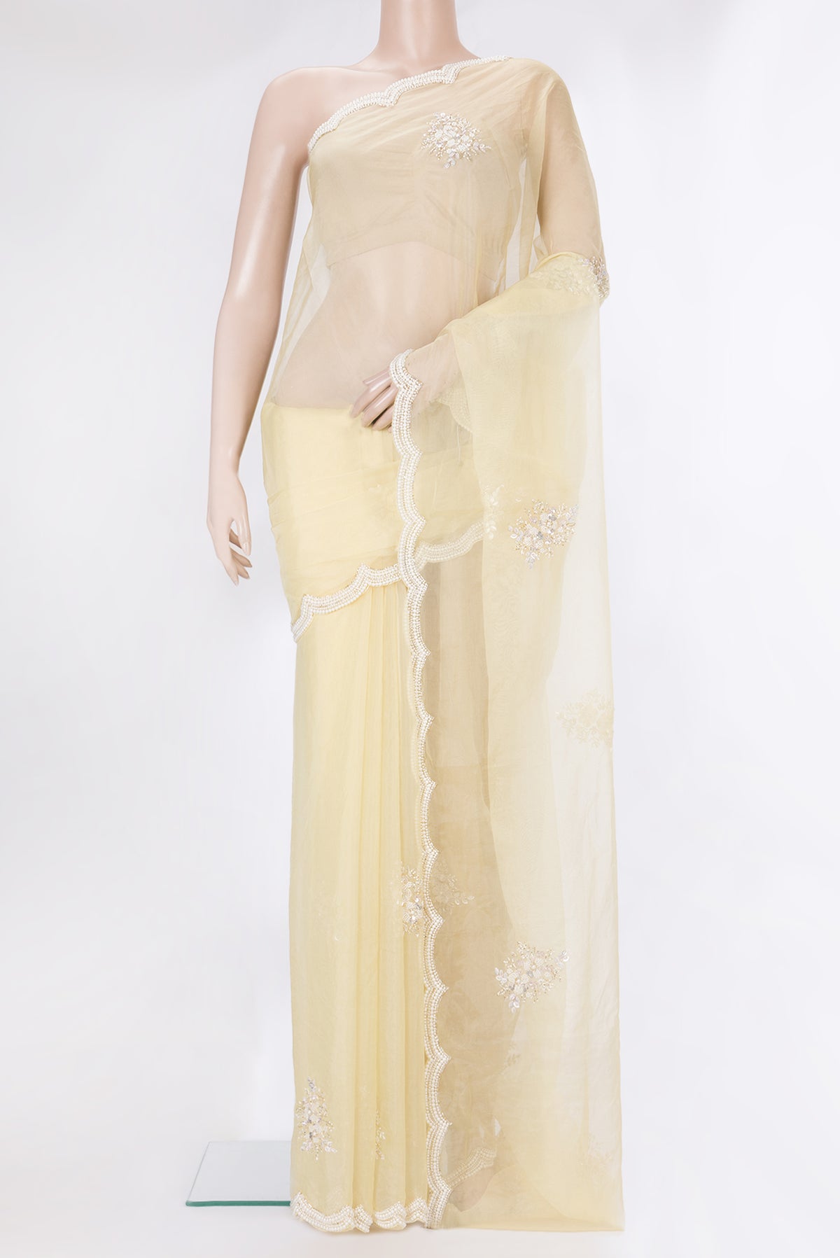 Pure Silk Sandal Dual Tone Organza Saree with Embroidery on the body and Sequin Border.  displayed on a mannequin