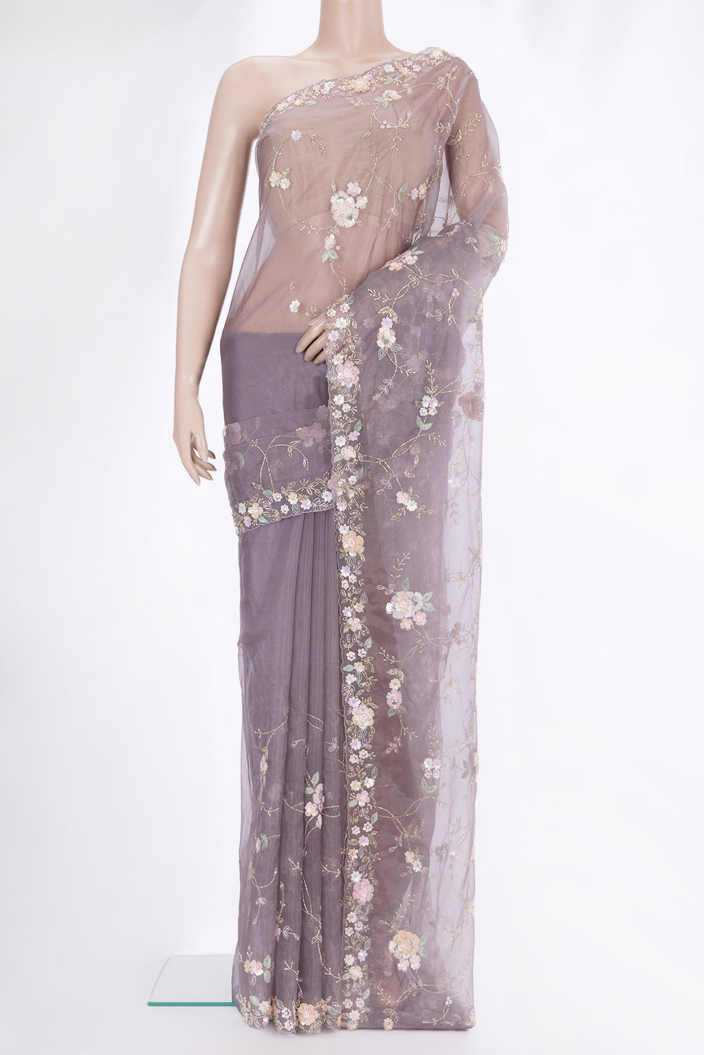 Grey Organza Saree with Embroidered on the body and Sequin Border.  displayed on a mannequin
