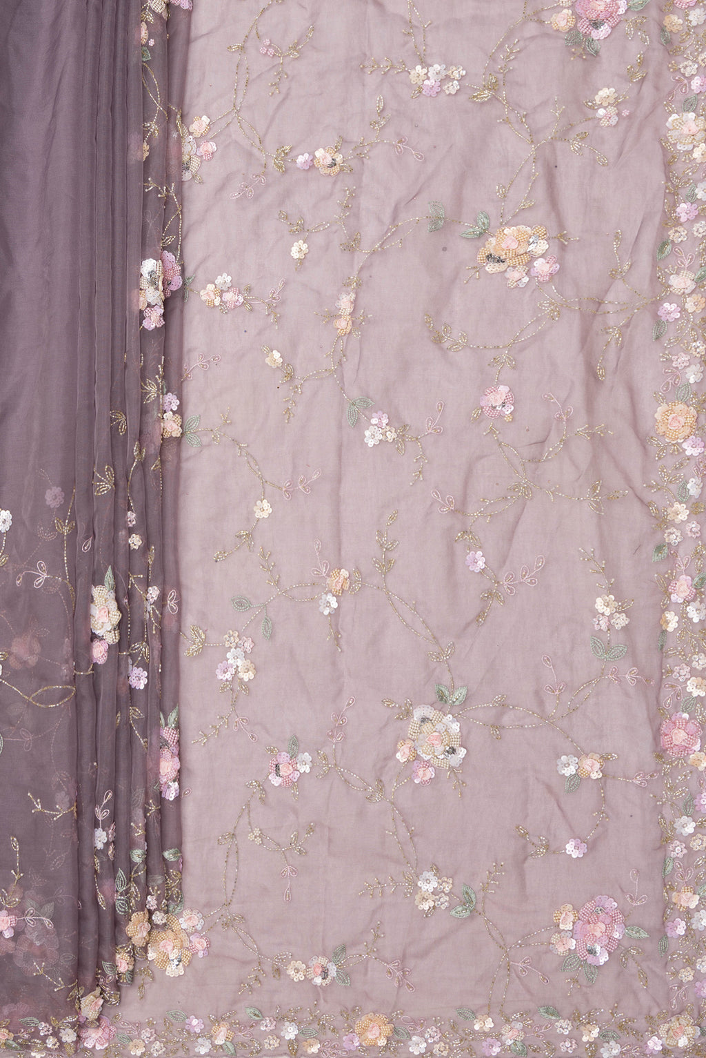 Pleats and pallu of Grey Organza Saree with Embroidered on the body and Sequin Border. 