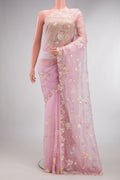 Pure Silk Pink Organza Saree with Embroidered on the body and Sequin Border.  displayed on a mannequin